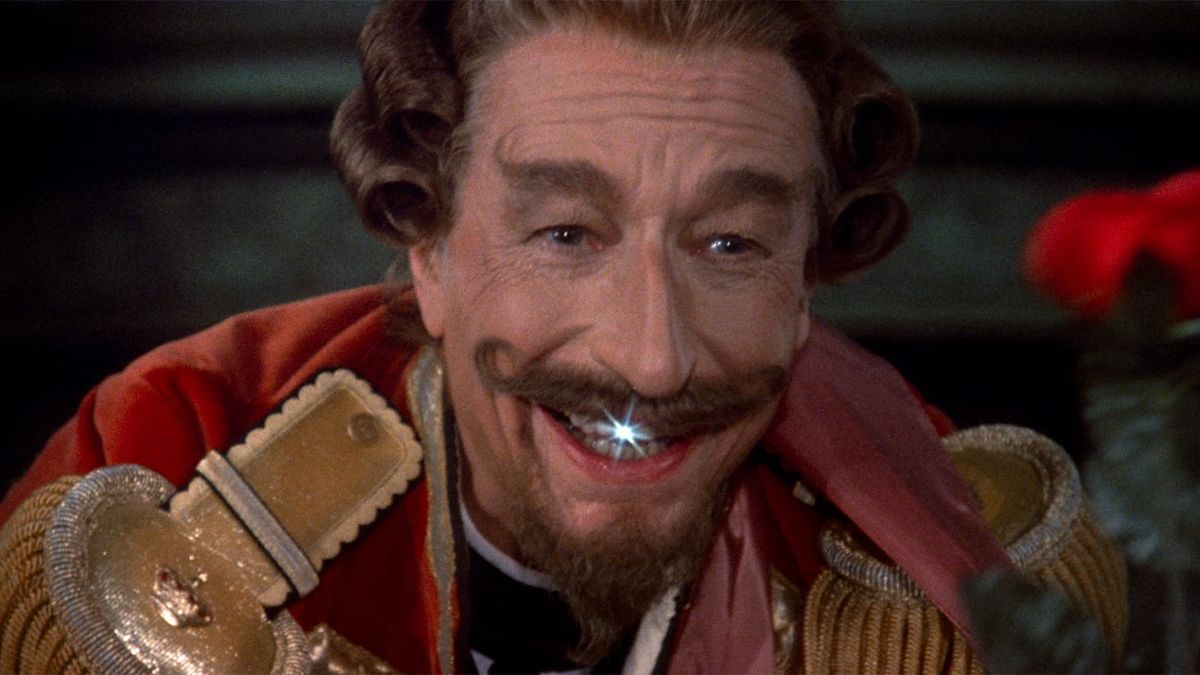 John Neville as Baron Munchausen, his smile gleaming as only Terry Gilliam can ensure it would.