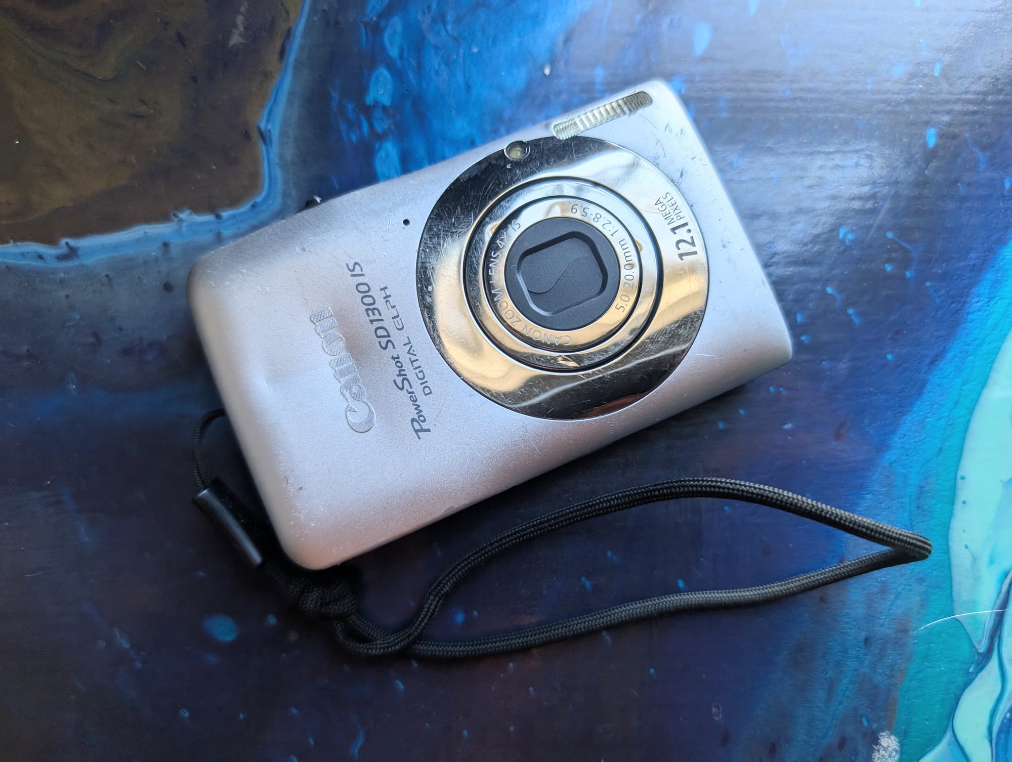 a beat-up canon powershot sd1300 IS