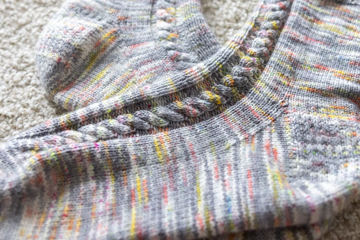No Thoughts, Just Socks: free cuff-down sock pattern with a heel flap and simple cable
