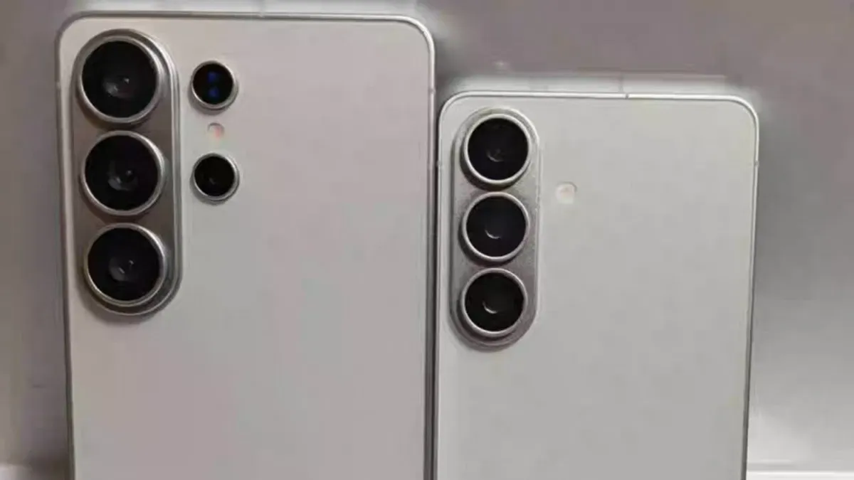 A person holding a remote control in their hand