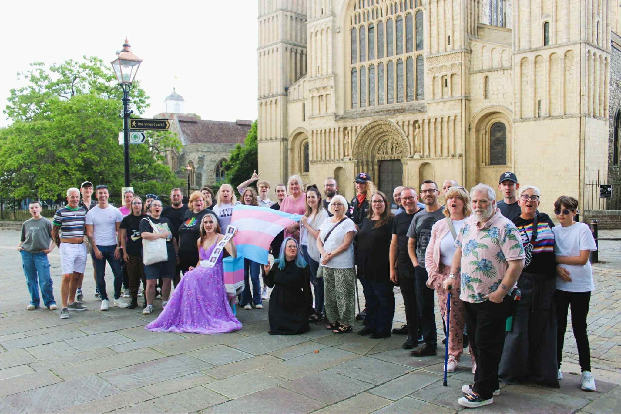 A group of people standing outside

AI-generated content may be incorrect.