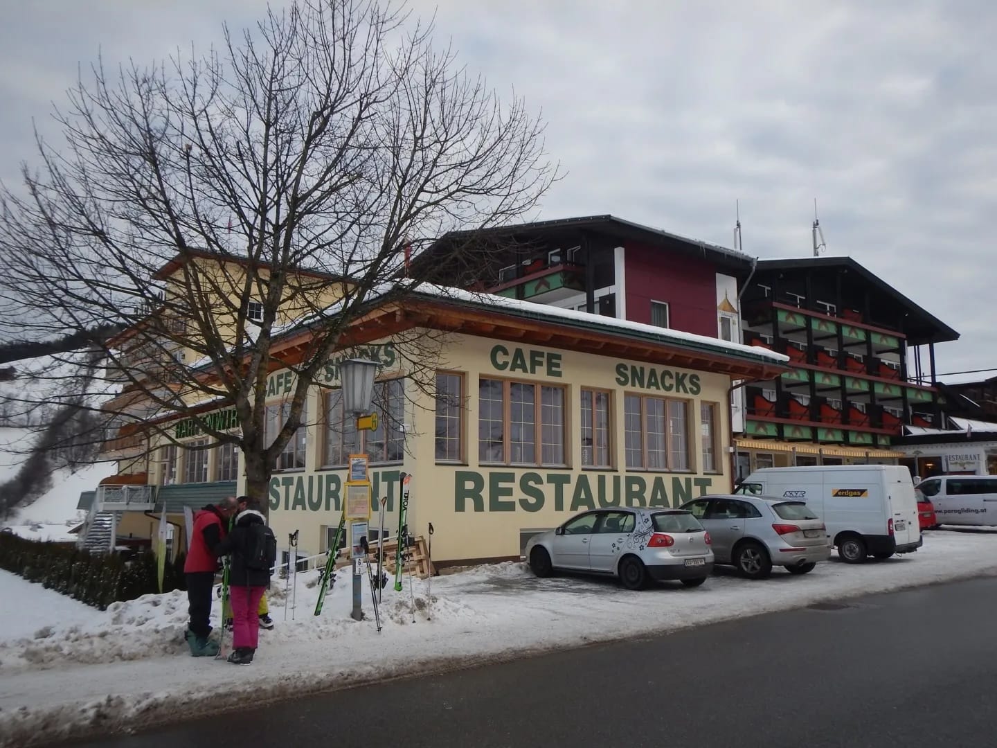Photo by Author — the Harfenwirt Hotel and Bus Stop
