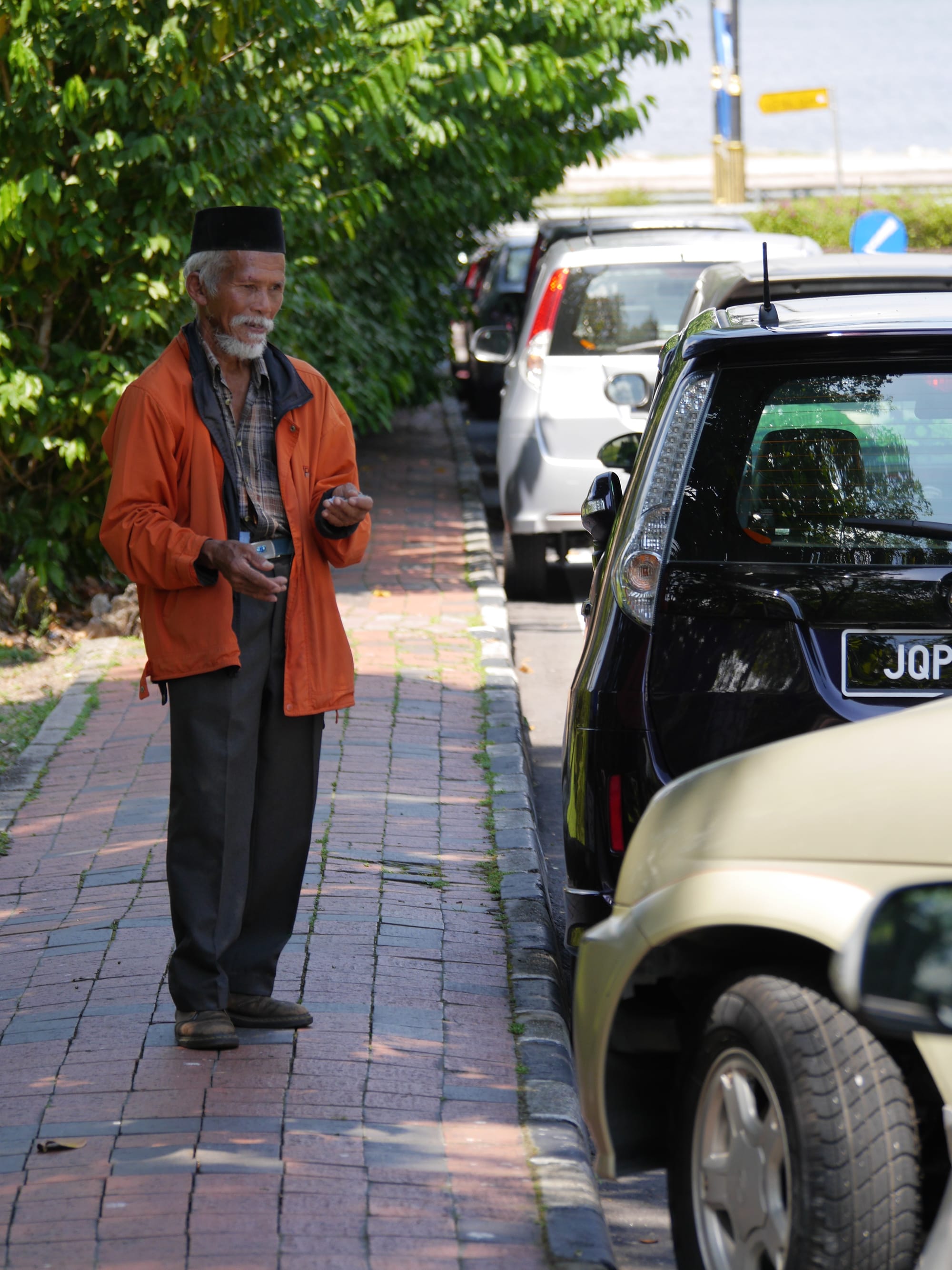 Photo by Author — unofficial carpark attendant — The Zoo, Johor Bahru, Johor, Malaysia