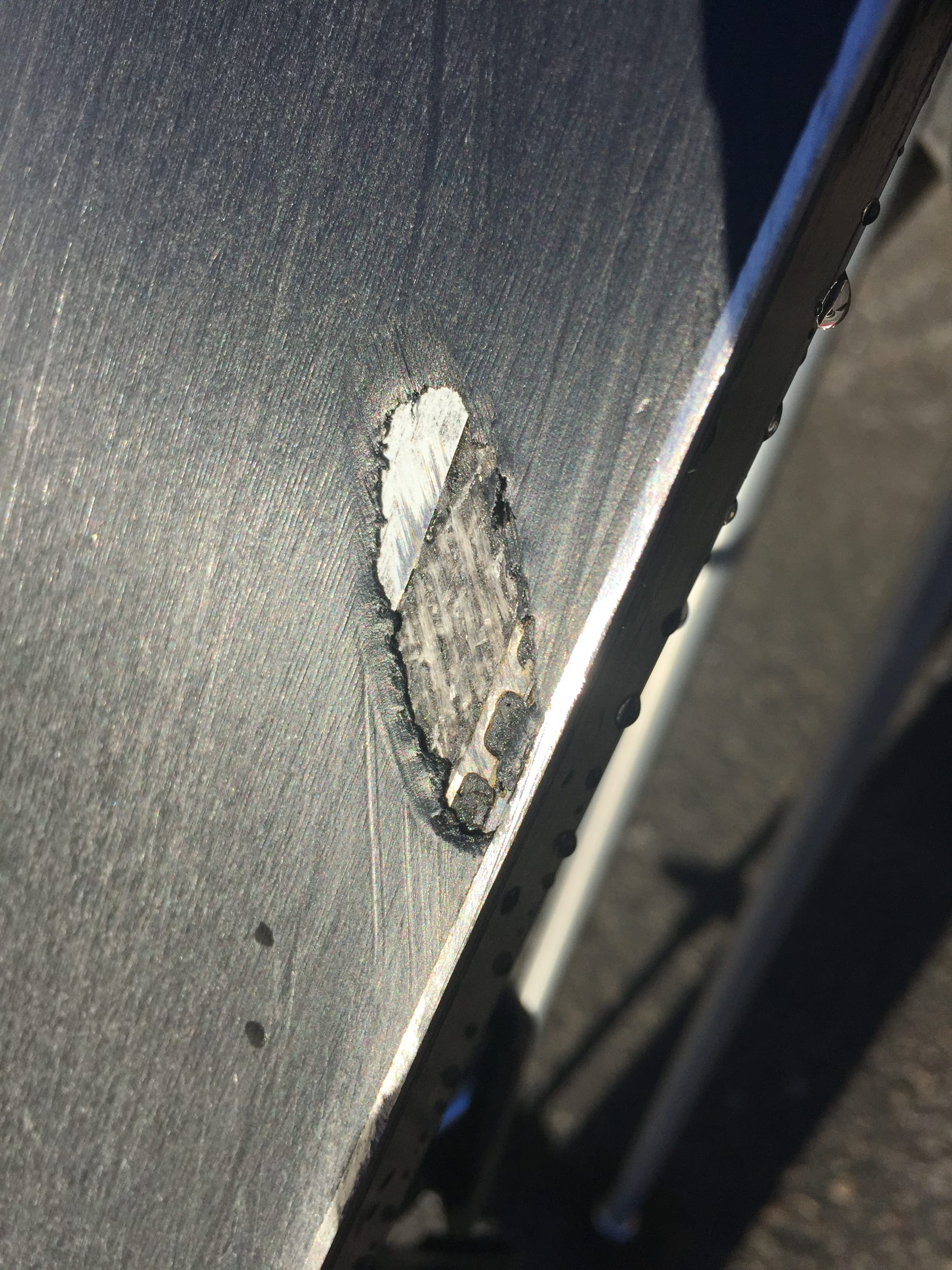 Photo by Author — Yikes! A big chunk out of my skis