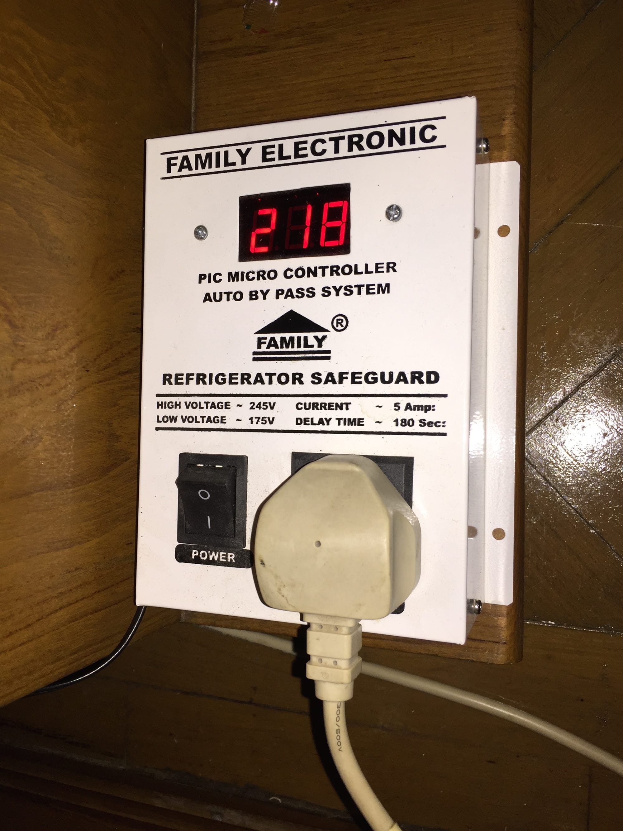 Photo by Author — surge protector on the ‘fridge