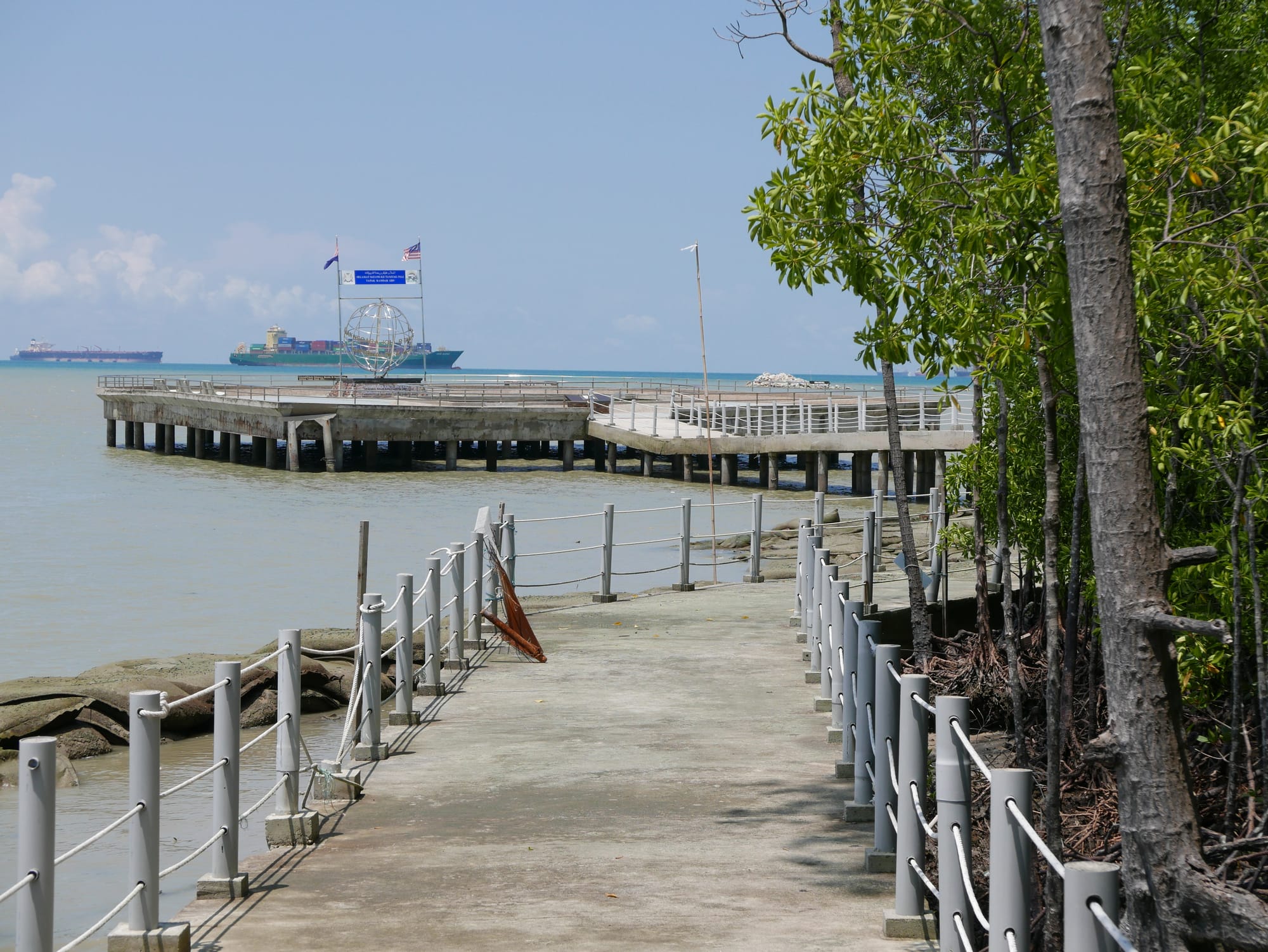 Photo by Author — the most southerly point in mainland Asia with a collapsed walkway — Tanjung Piai National Park