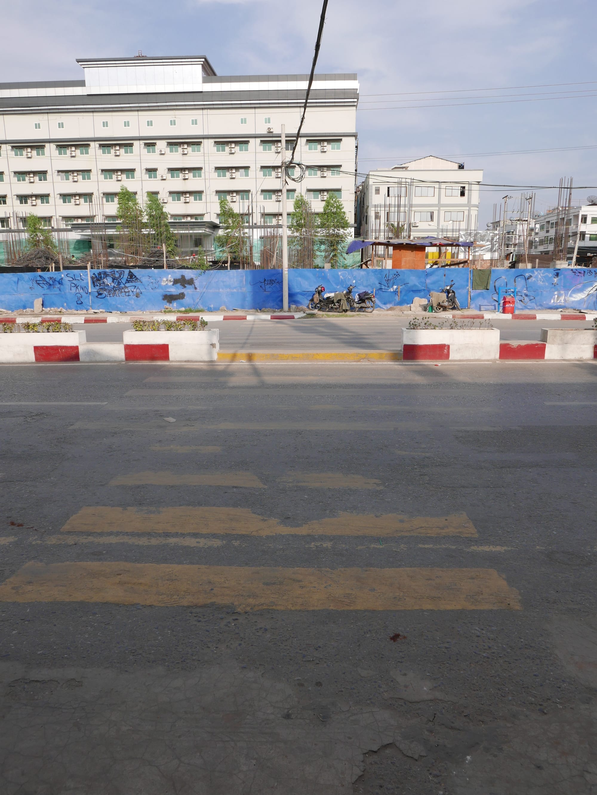 Photo by Author — a crosswalk in Mandalay — the traffic seemed to ignore it