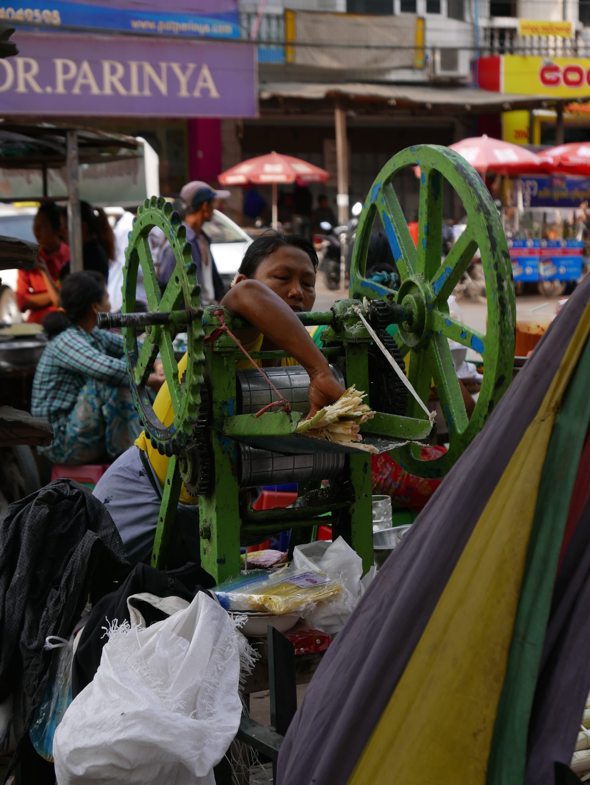 Photo by Author — crushing sugar cane — Mandalay