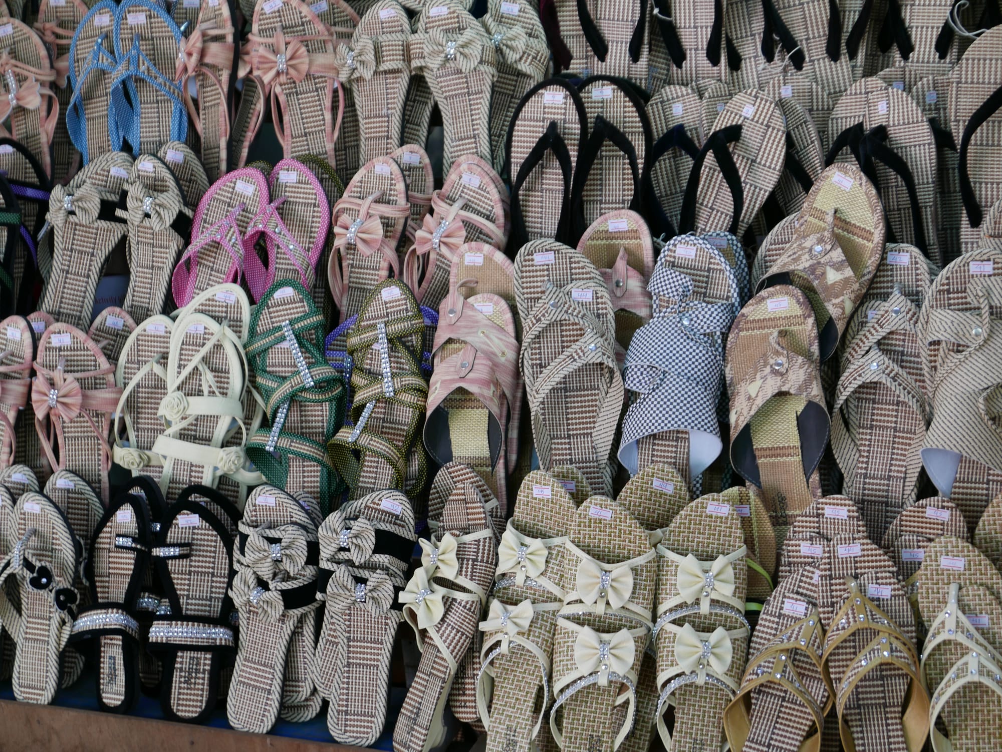 Photo by Author — shoe seller on Mandalay Hill