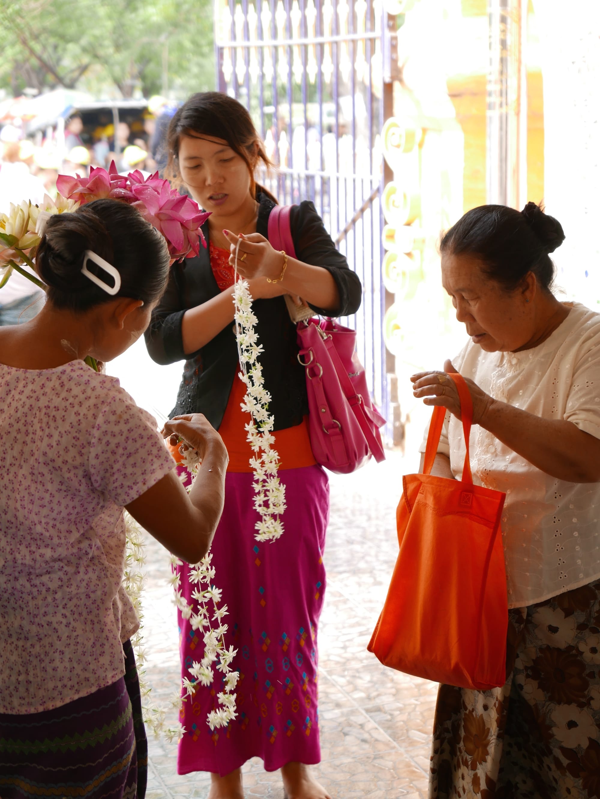 Photo by Author — flower and offering sellers — Maha Lawkamarazein or Kuthodaw Inscription Shrines, Mandalay, Myanmar (Burma)