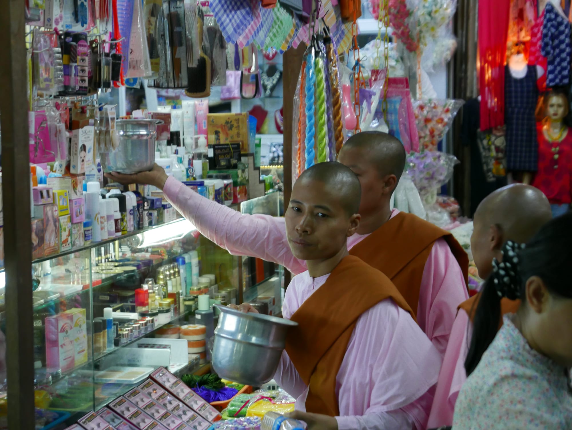 Photo by Author — “pink nuns” collecting in Bogyoke Market (Scotts Market)