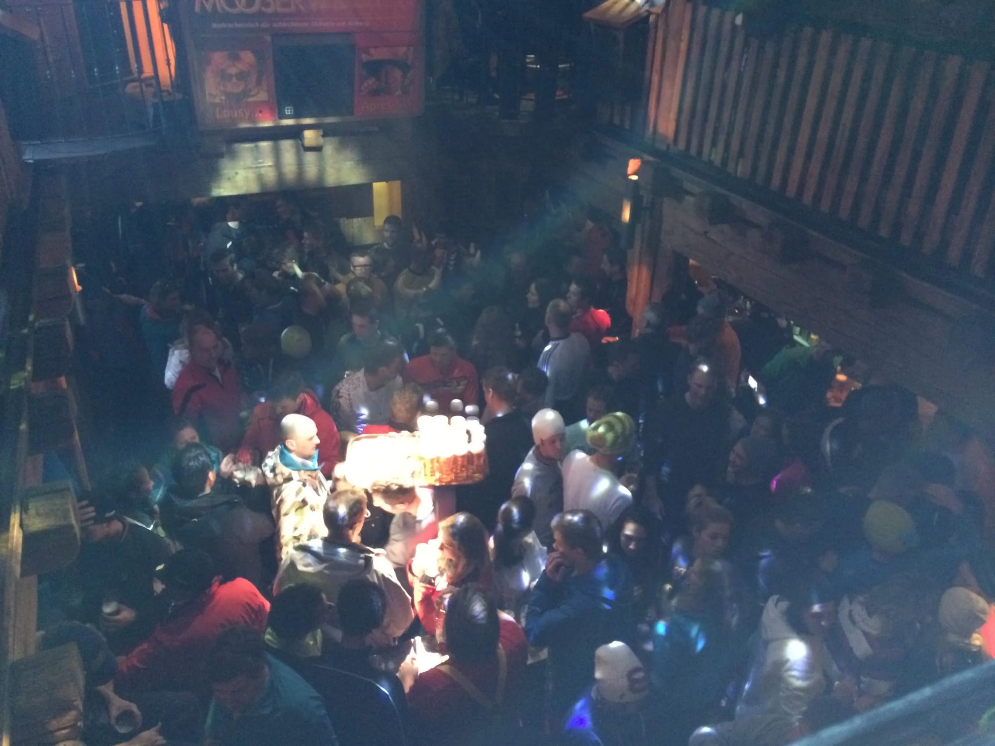Photo by Author — partying inside Mooserwirt — note the tray of beers