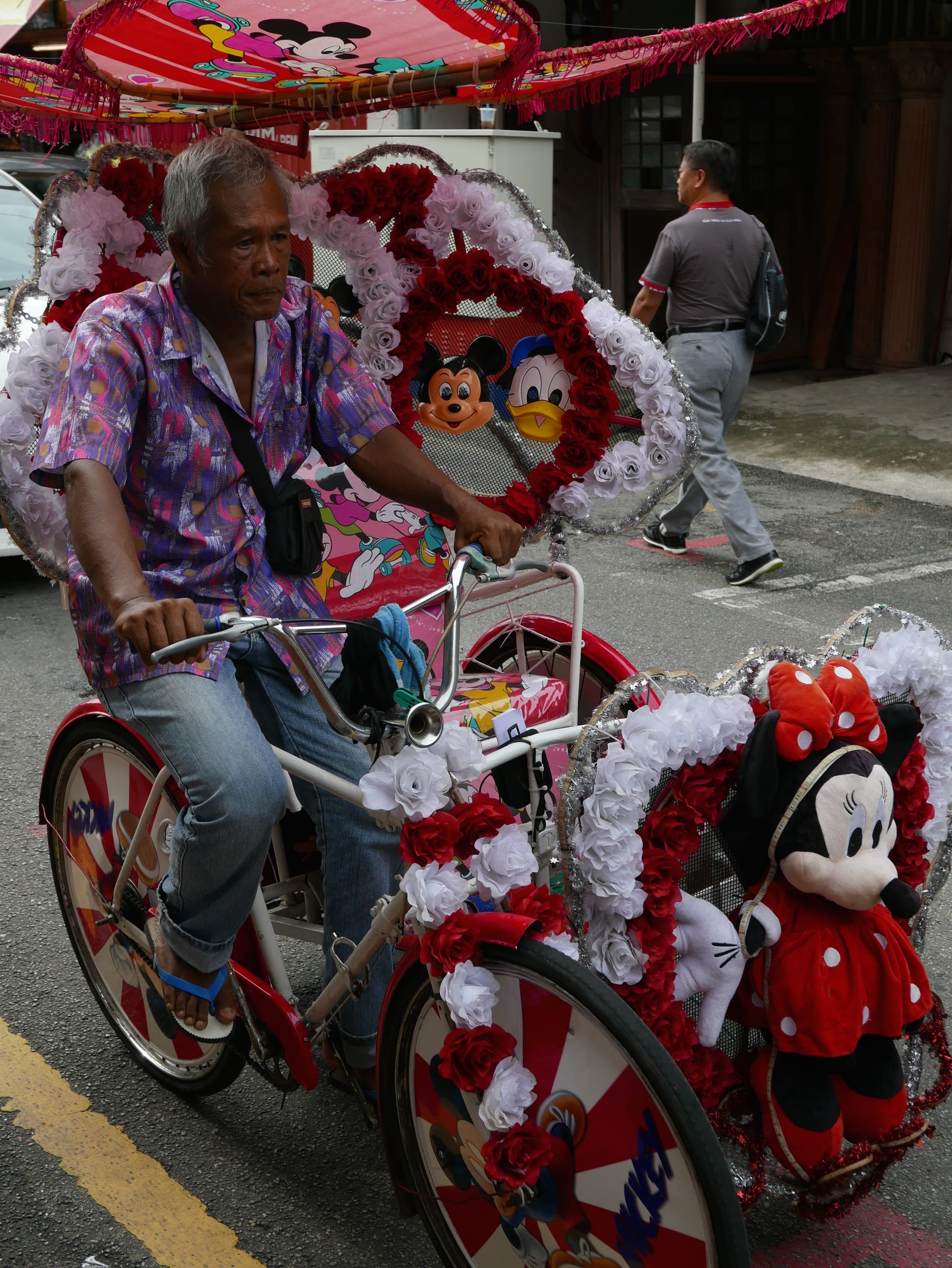 Photo by Author — The Strange Trishaws of Malacca, Malaysia