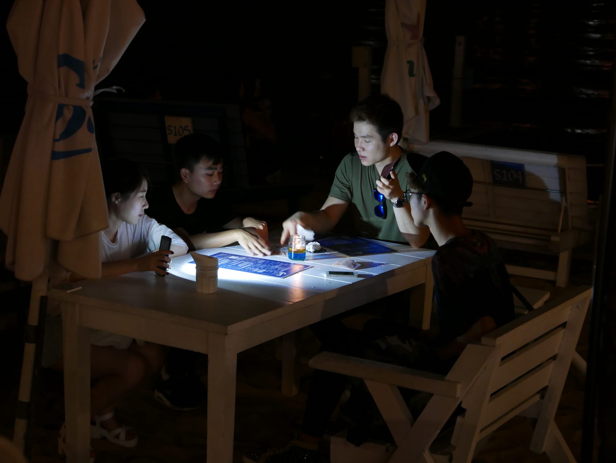 Photo by Author — diners at Coastes, Siloso Beach, Singapore