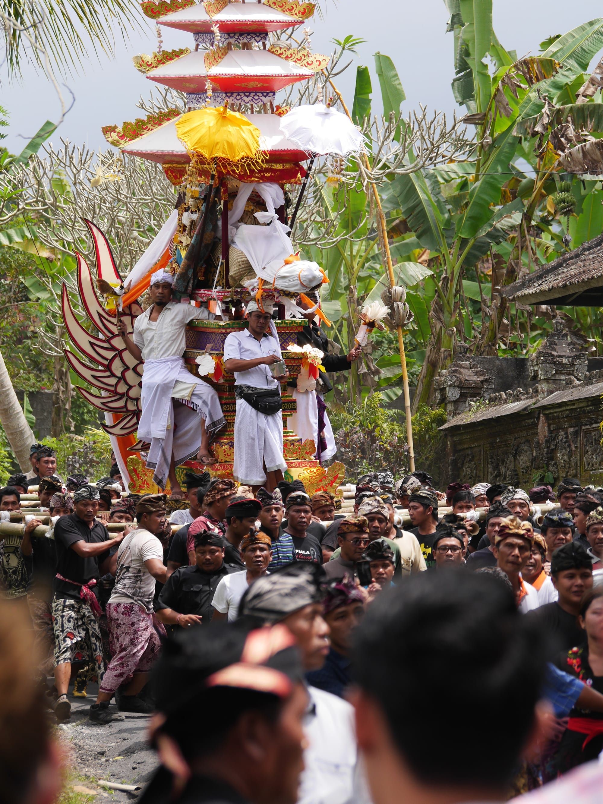 Photo by Author — mourners at a cremation procession in Bali