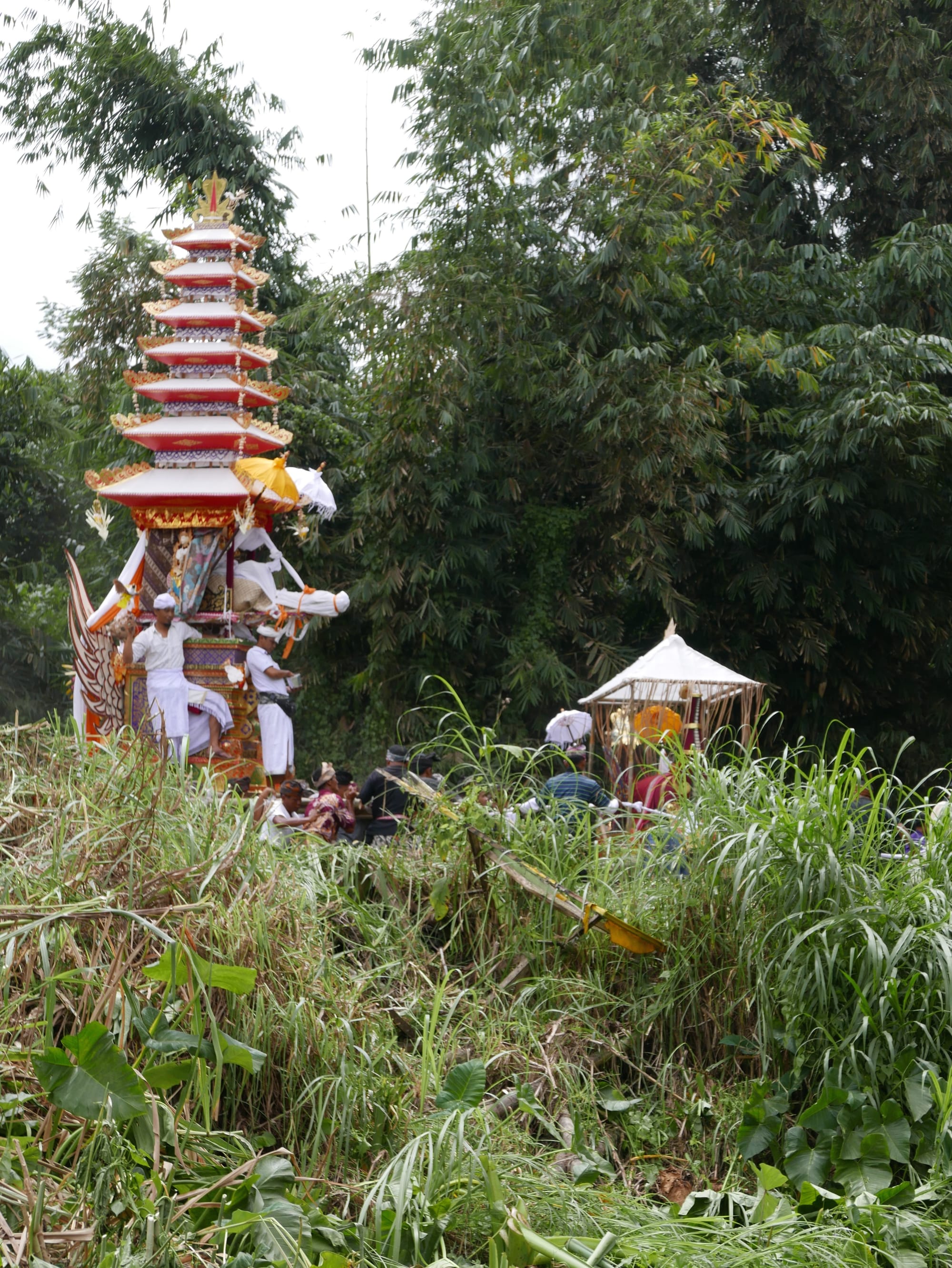 Photo by Author — mourners at a cremation procession in Bali