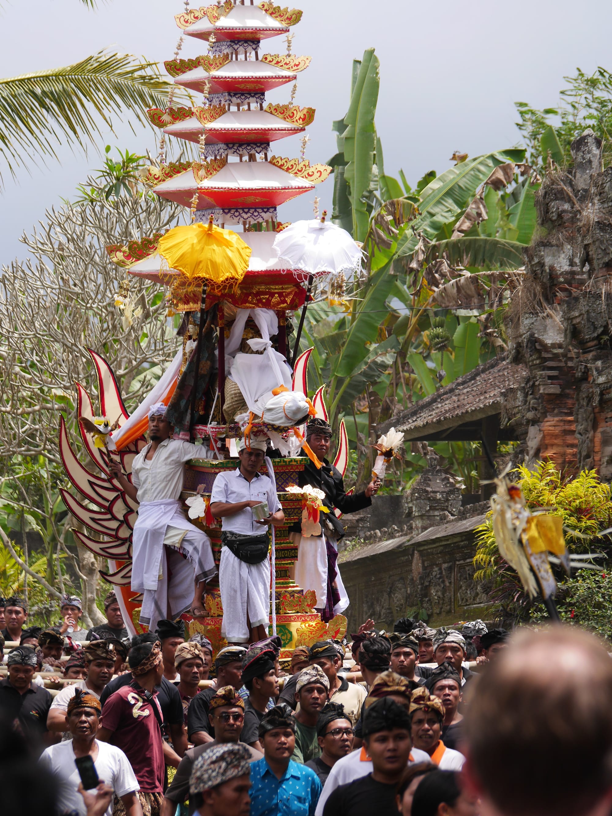 Photo by Author — mourners at a cremation procession in Bali