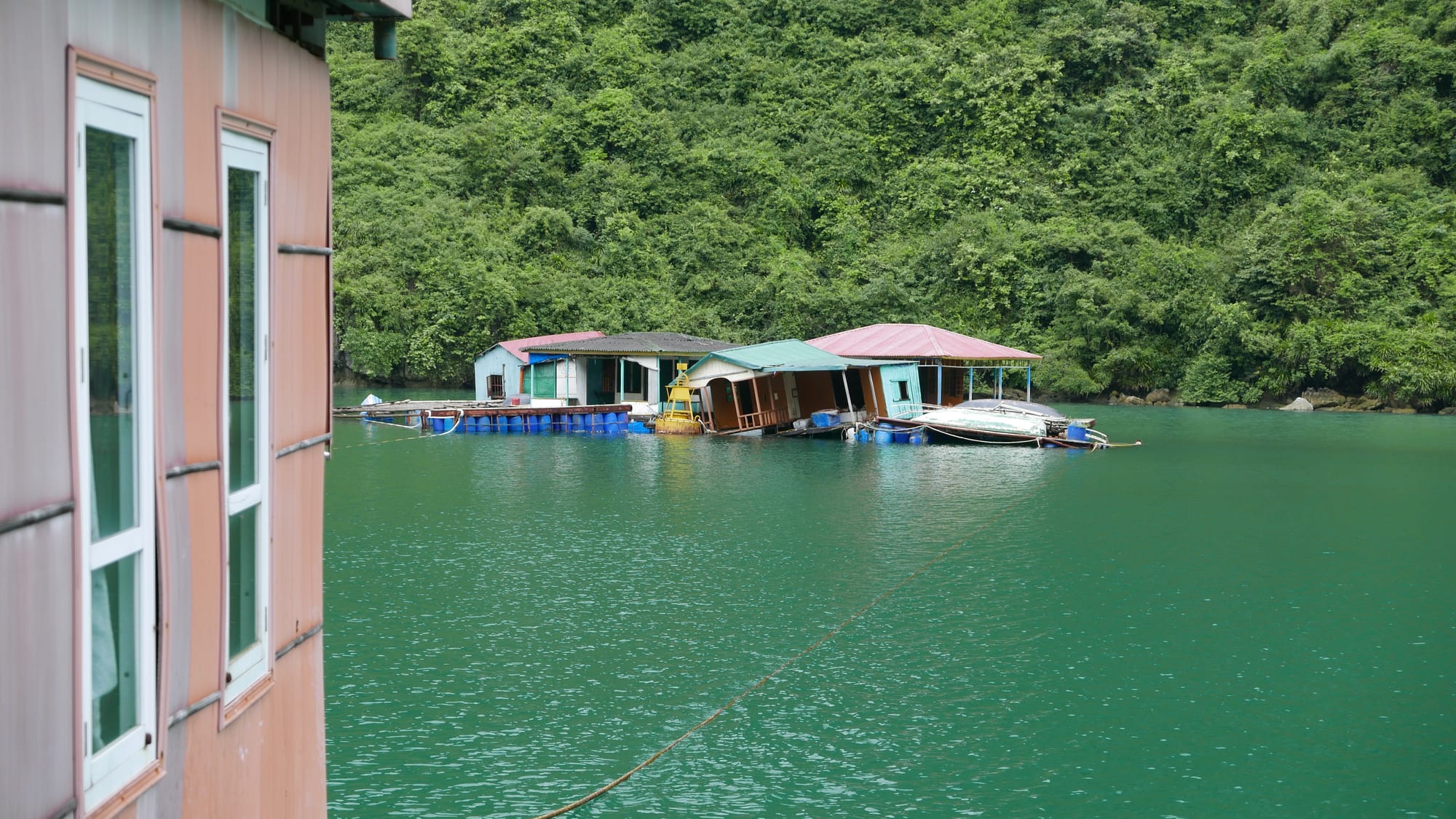 Photo by Author — abandoned houses in a fishing village, Ha Long Bay, Vietnam