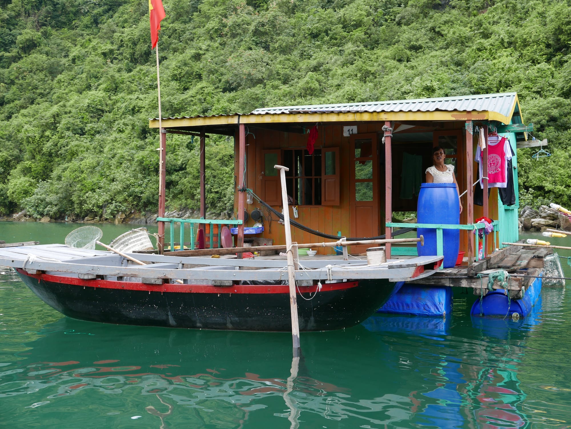 Photo by Author — a house in a fishing village, Ha Long Bay, Vietnam