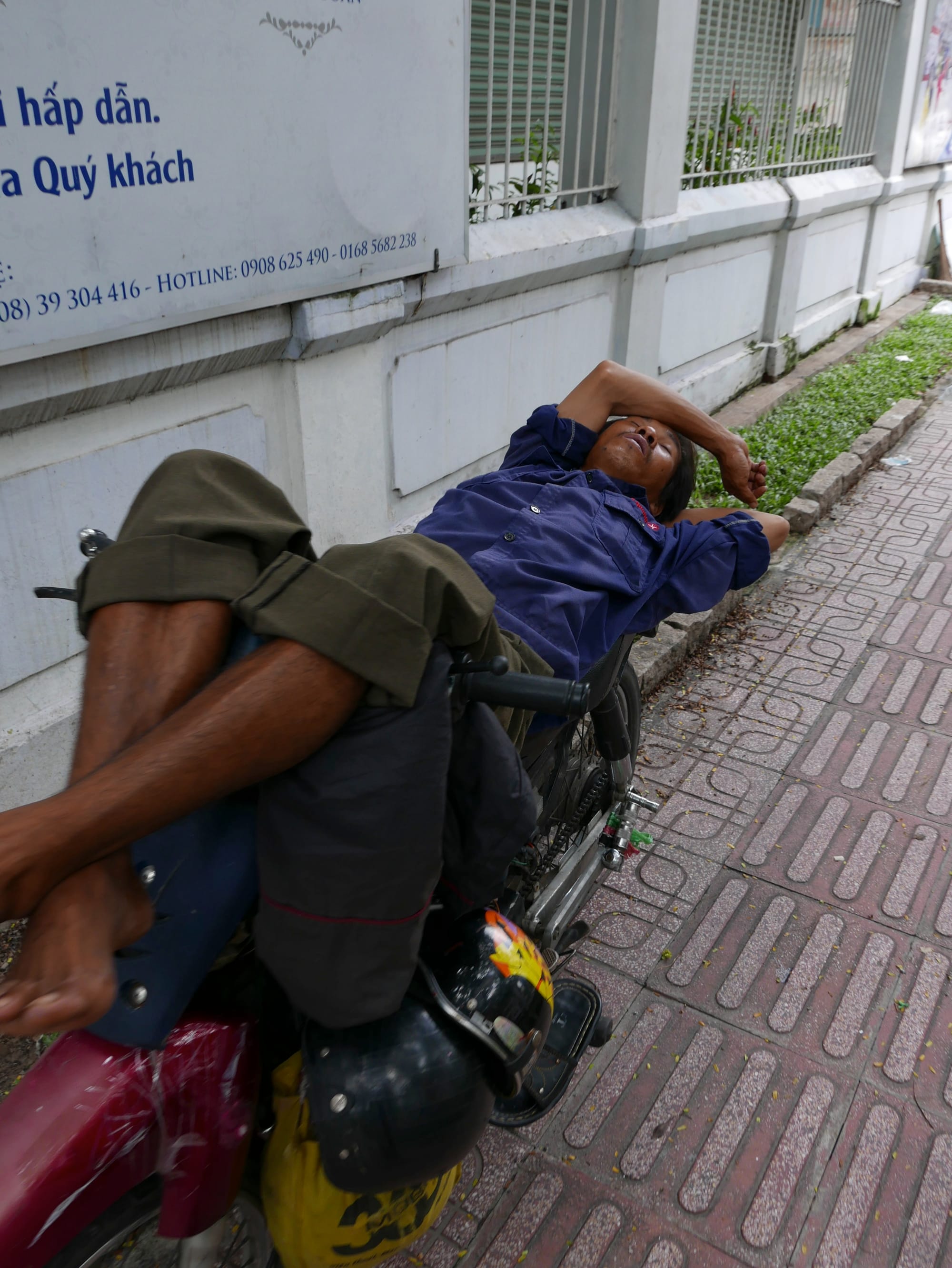 Photo by Author — relaxing on a bike — photos from around Ho Chi Minh City (Saigon), Vietnam