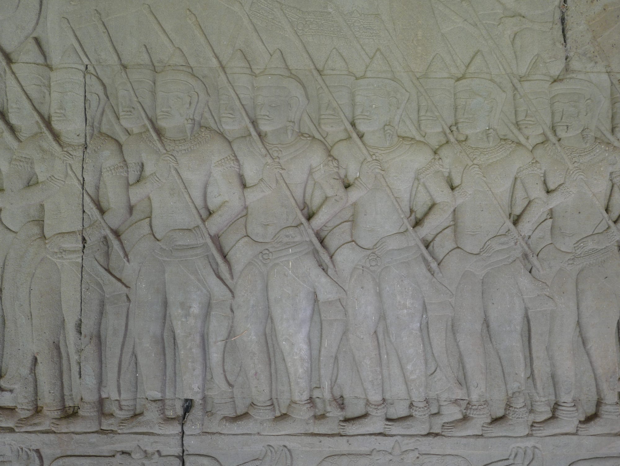 Photo by Author — carved soldiers — Angkor Wat Temple (អង្គរវត្ត), Angkor Archaeological Park, Angkor, Cambodia