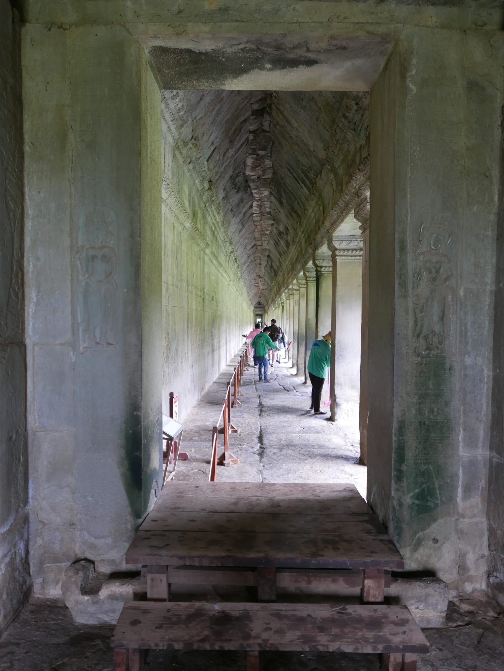 Photo by Author — looking down a gallery — Angkor Wat Temple (អង្គរវត្ត), Angkor Archaeological Park, Angkor, Cambodia