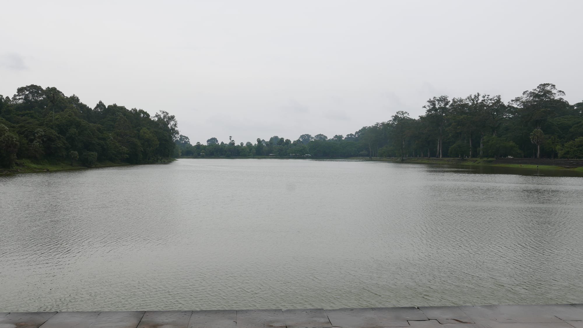 Photo by Author — the moat at Angkor Wat Temple (អង្គរវត្ត), Angkor Archaeological Park, Angkor, Cambodia