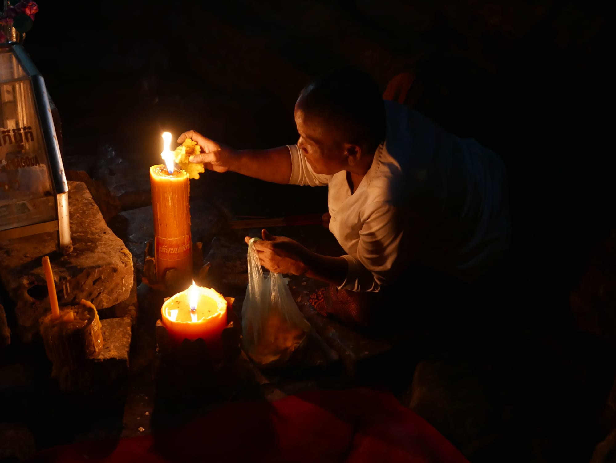Photo by Author — a worshipper at Angkor Thom (អង្គរធំ), Angkor Archaeological Park, Angkor, Cambodia