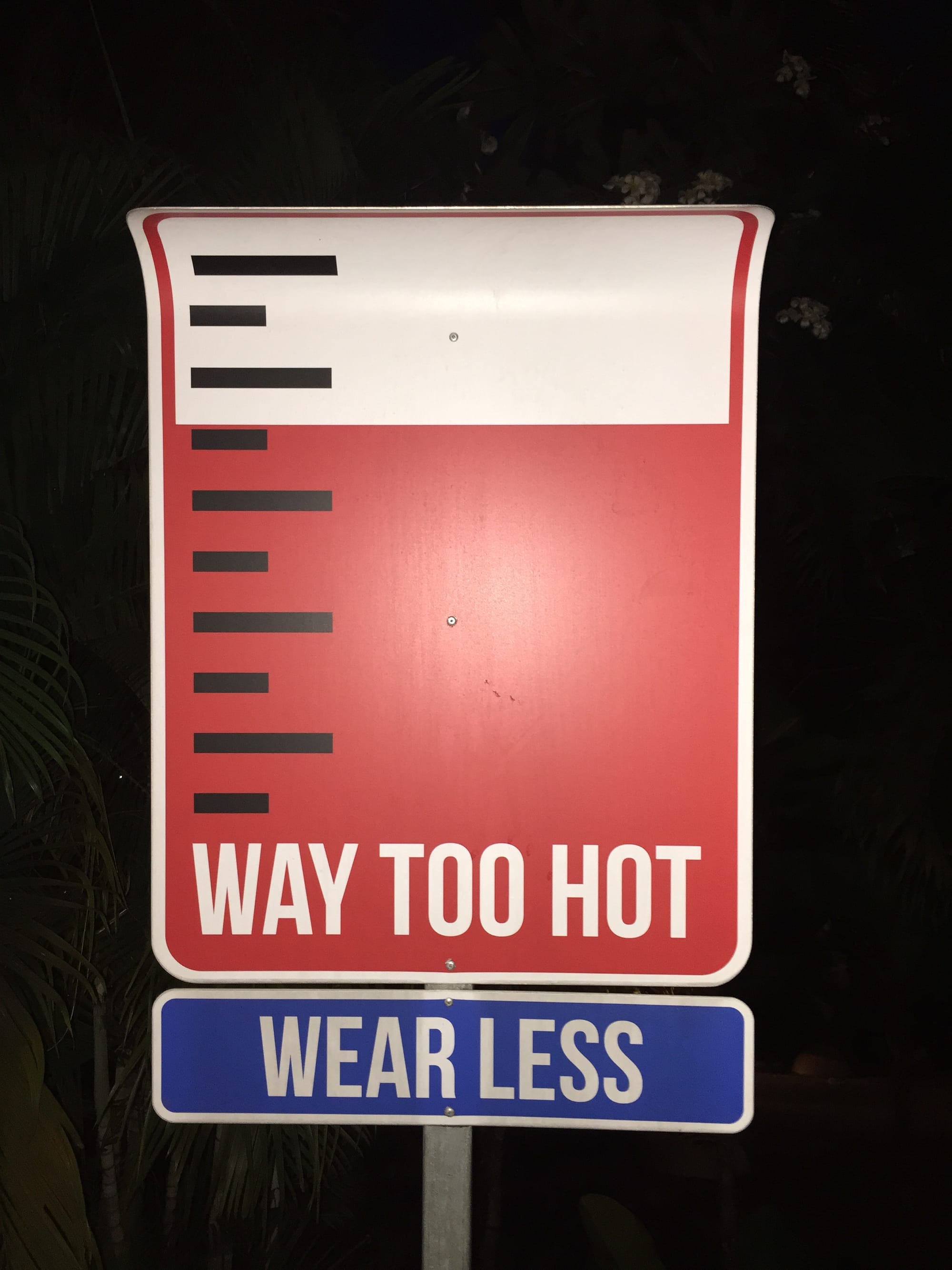 Photo by Author — strange sign at Siloso Beach, Singapore