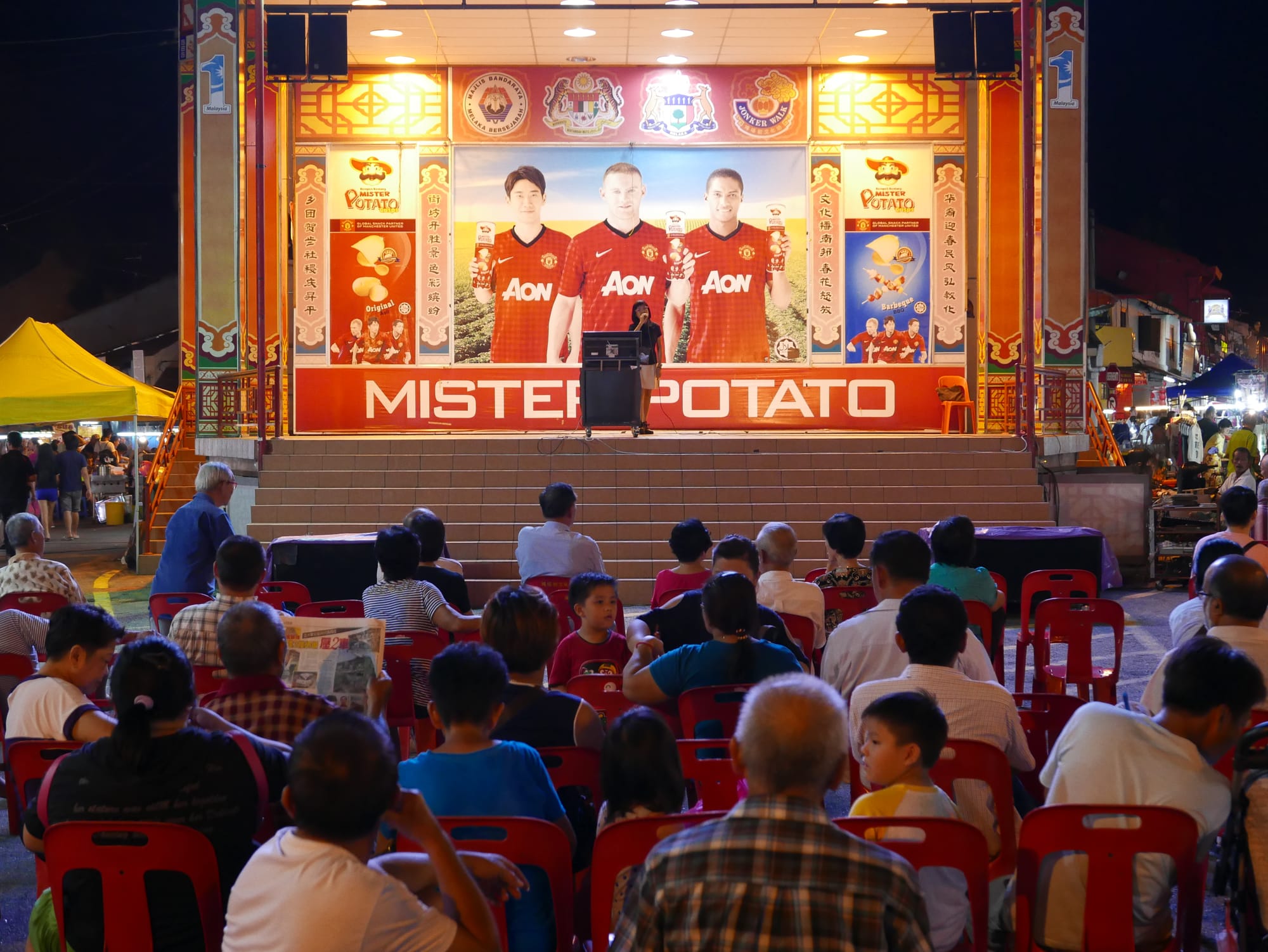 Photo by Author — singing at the Night Market, Malacca, Malaysia