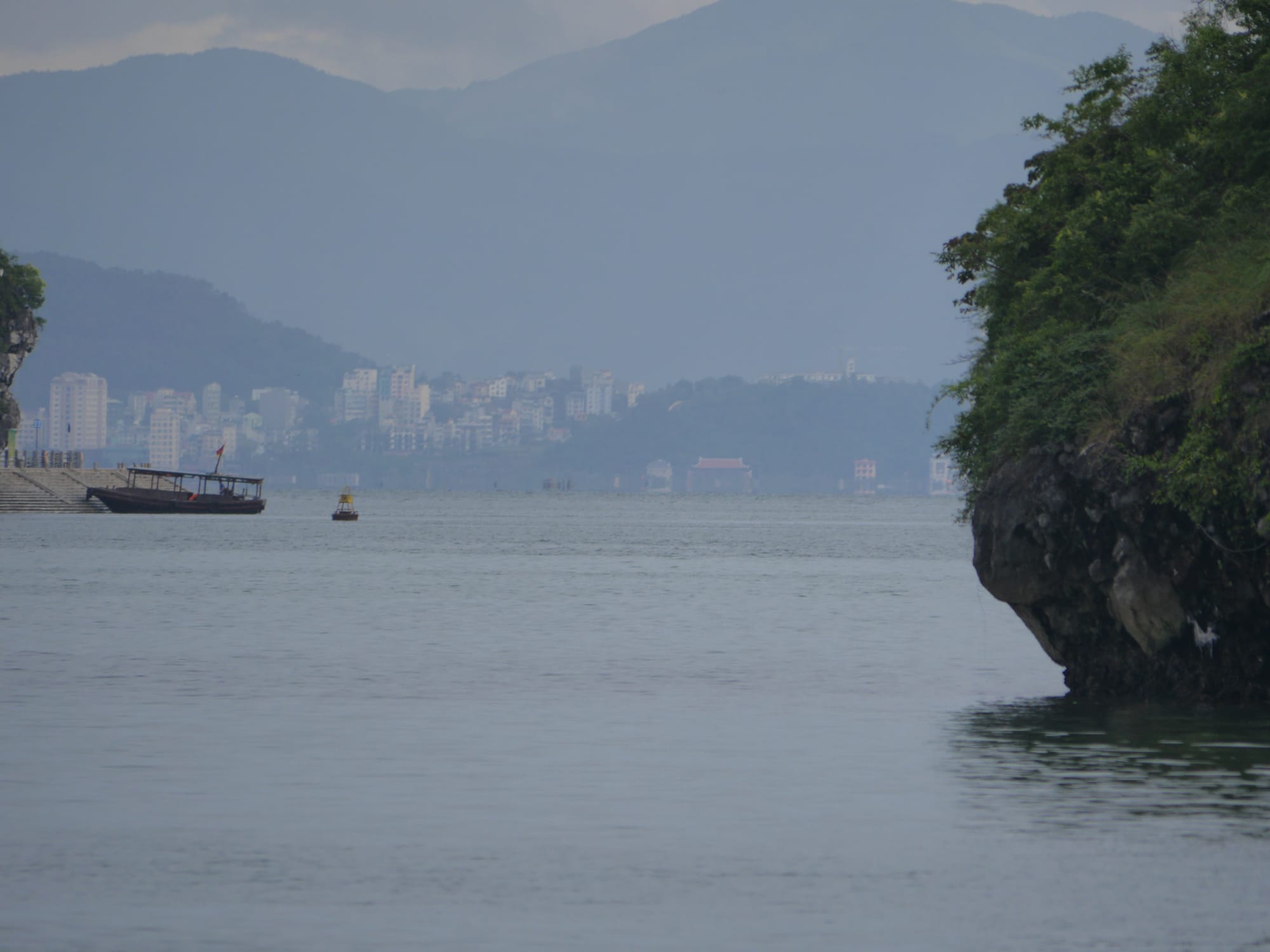 Photo by Author —the ever-present local city in Ha Long Bay, Vietnam