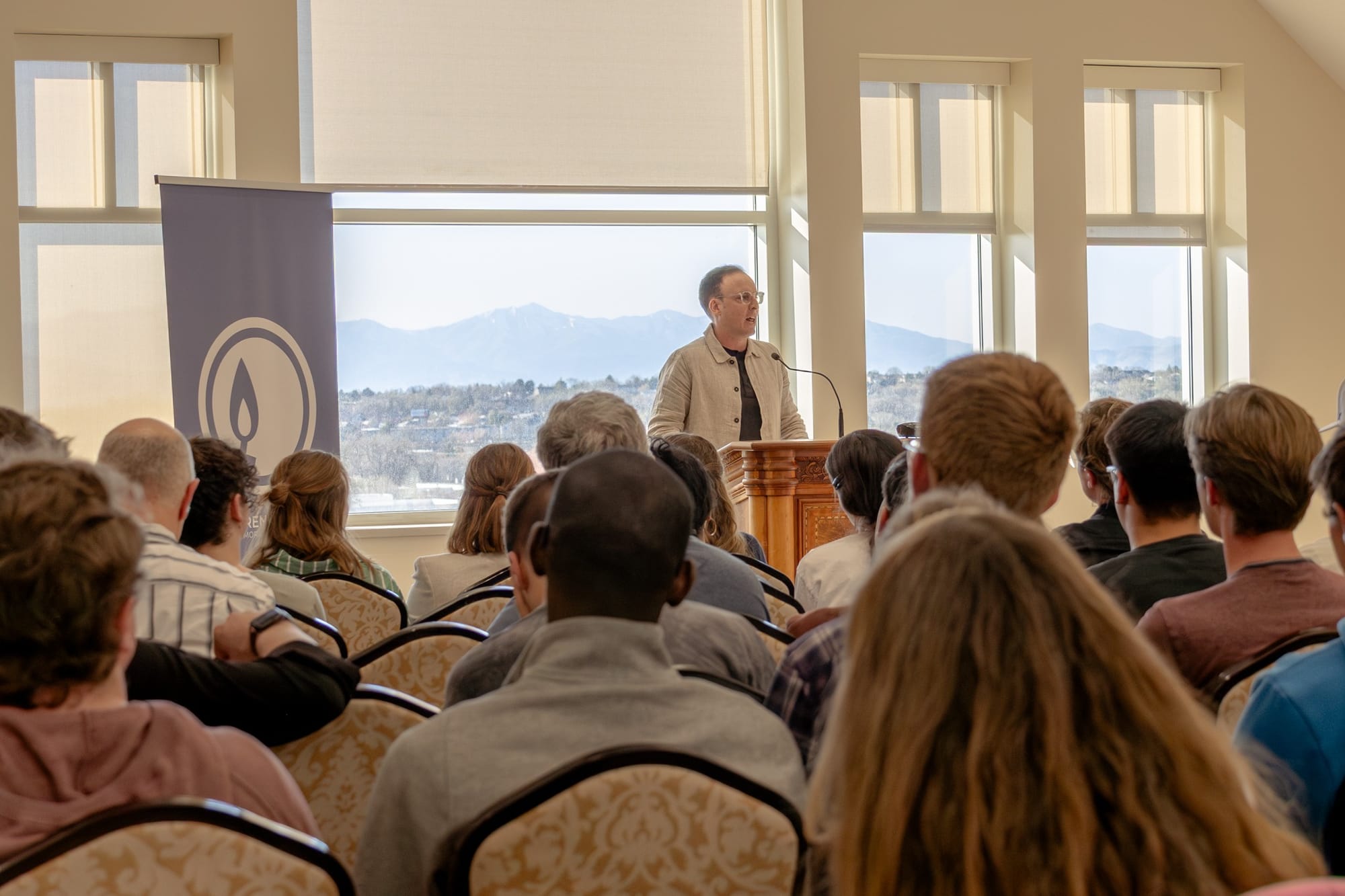 Tangle Founder Isaac Saul speaking to college students at BYU | Image: Madison Robinette