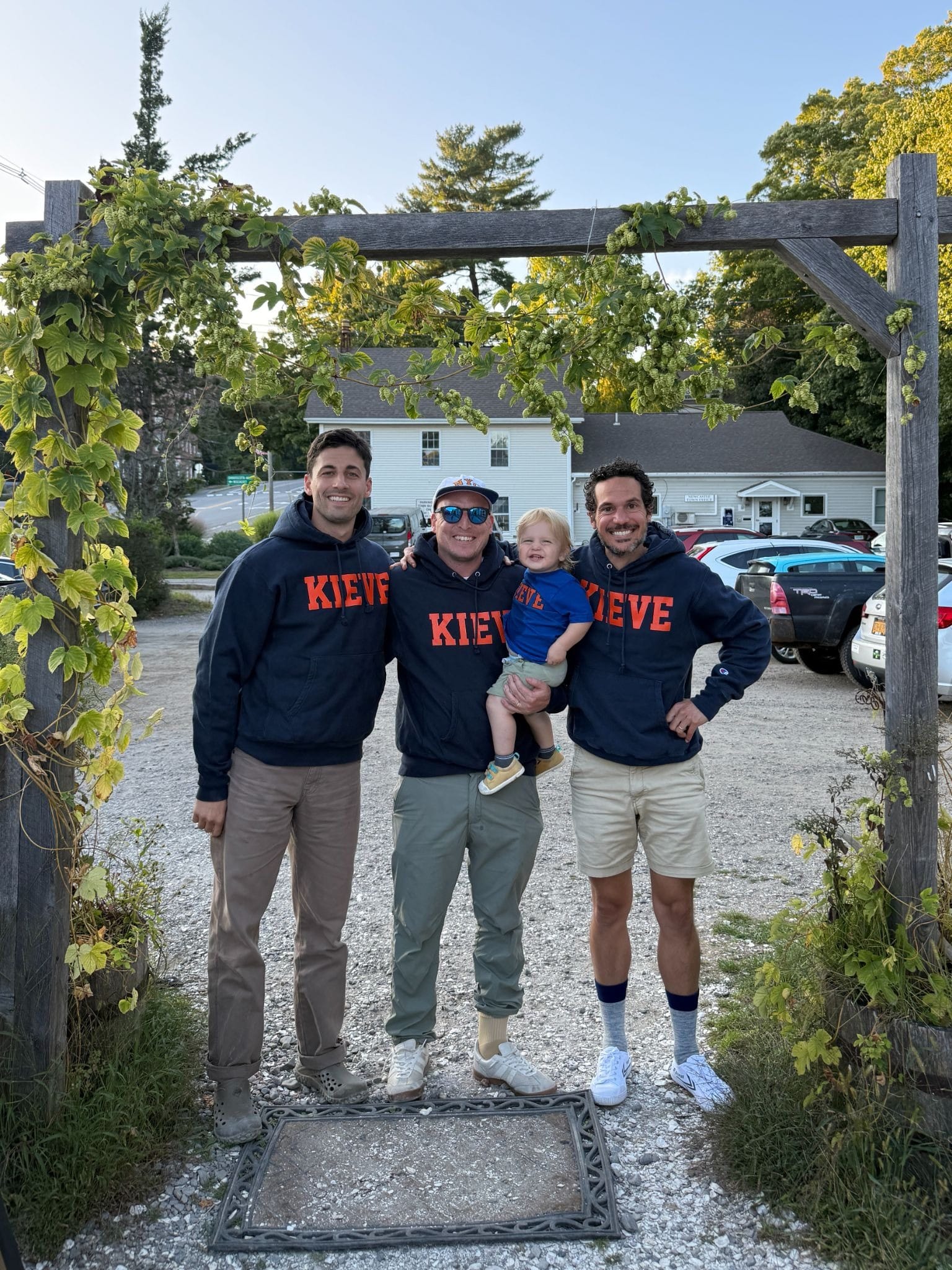 The Tangle team rocking our new swag from Camp Kieve. From left to right: Senior Editor Will Kaback, Executive Editor Isaac Saul, Isaac's son Omri, and video editor Michele Teodori.