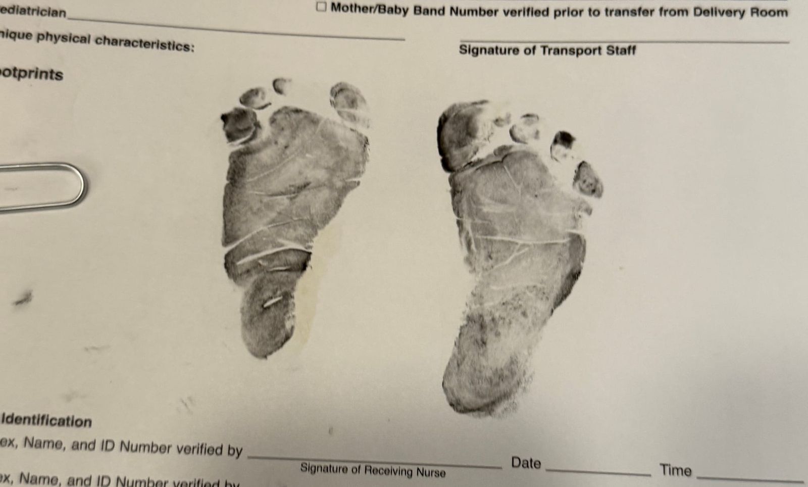 Baby footprints on a medical document.