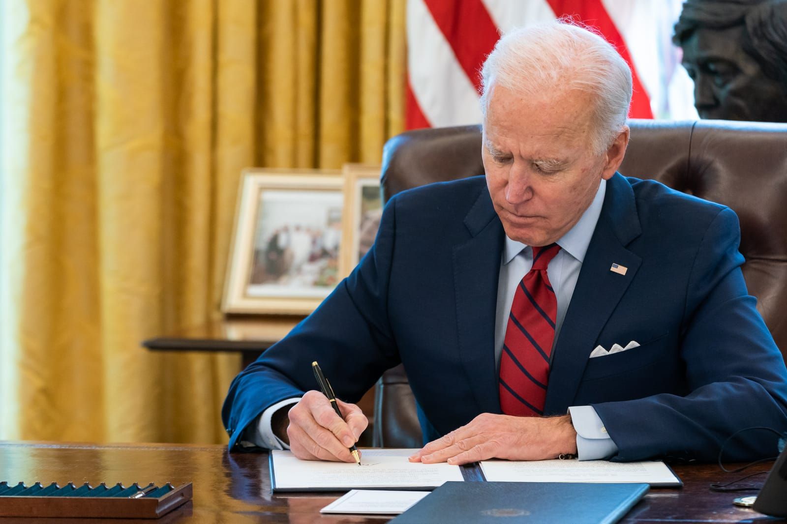 President Joe Biden in the Oval Office in 2021. Photo Credit: Adam Schultz