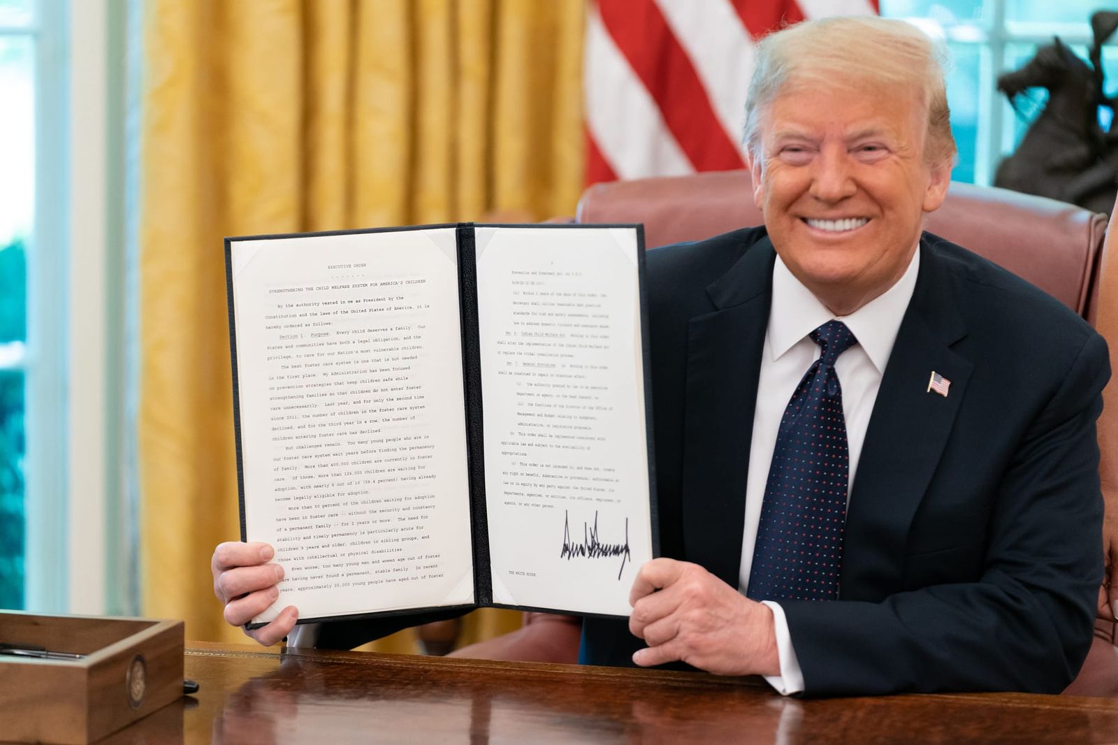 President Donald Trump signs an executive order. | Credit: The White House