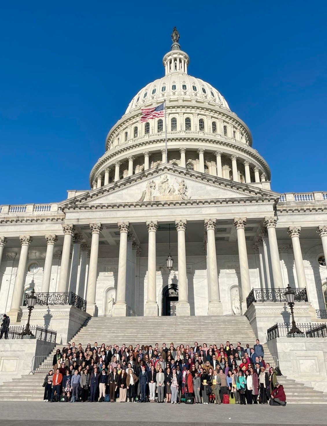 The author with some new friends in front of the U.S. Capitol in Washington, D.C. | Image: Kristen Buse