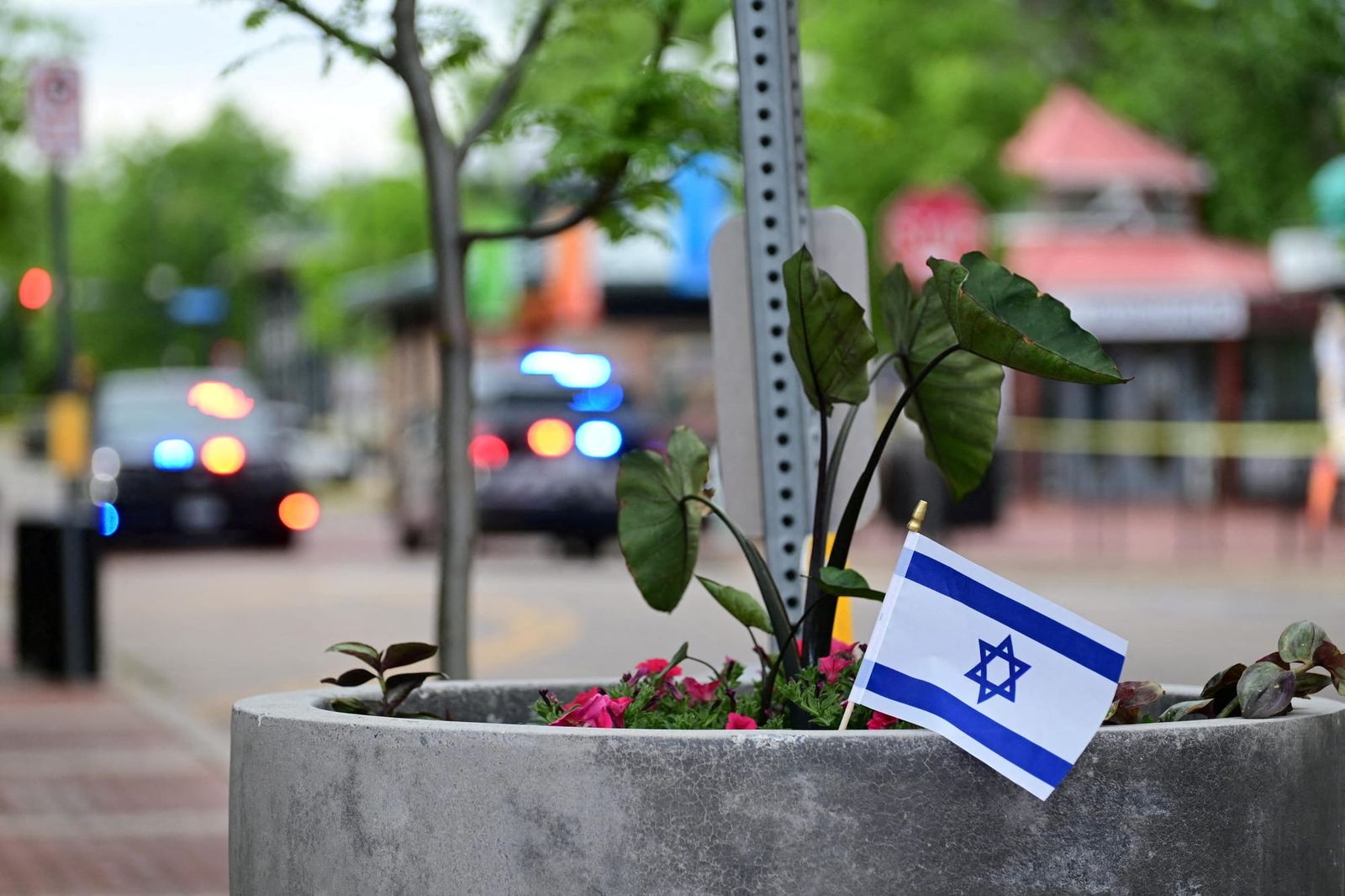 An Israeli flag in front of police tape in Boulder, Colorado — June 1, 2025 | REUTERS/Mark Makela