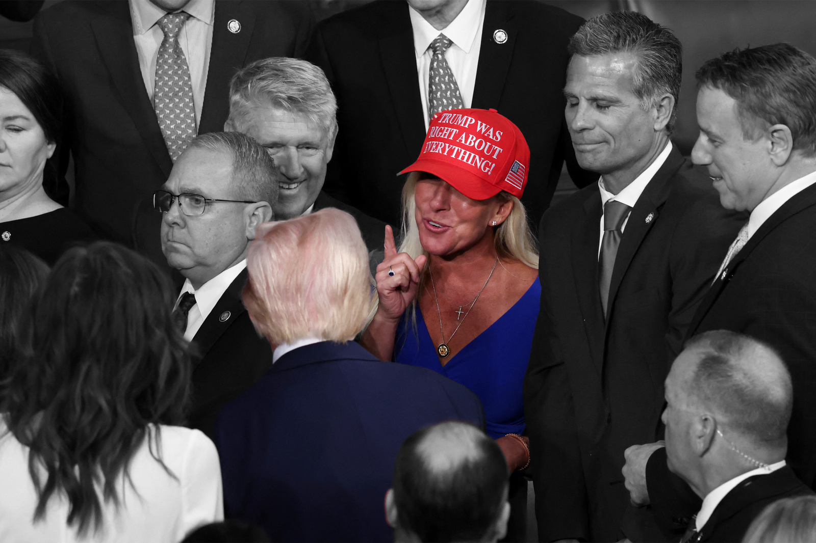 U.S. Rep. Marjorie Taylor Greene (R-GA) talking to President Donald Trump in the U.S. Capitol on March 4, 2025 | REUTERS/Evelyn Hockstein, edited by Russell Nystrom