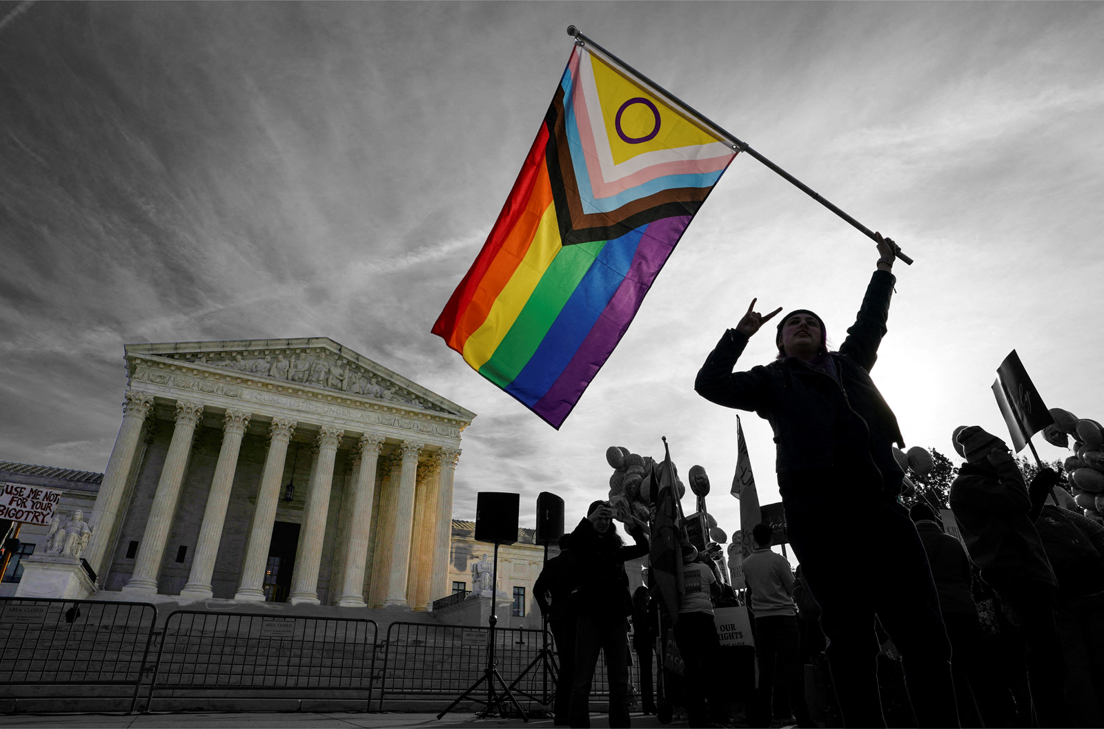 A protester outside the U.S. Supreme Court — December 2022. | REUTERS/Kevin Lamarque TPX IMAGES OF THE DAY, edited by Russell Nystrom