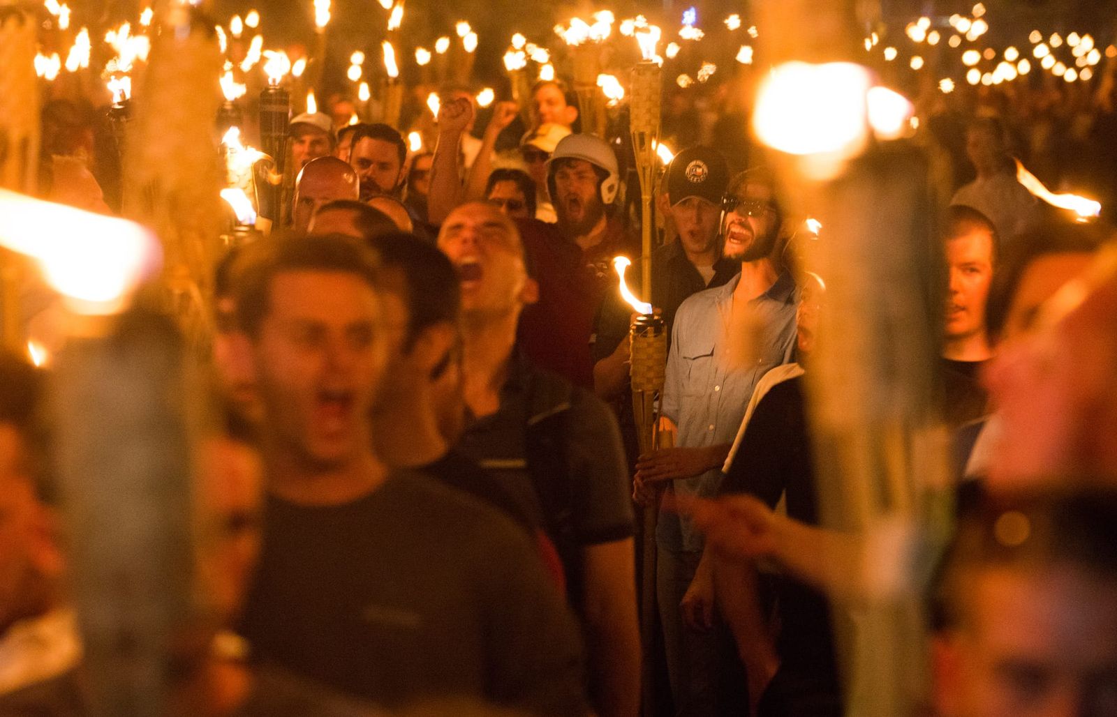 The 'Unite the Right' rally in Charlottesville, VA | Photo by Zach D Roberts/NurPhoto via Getty Images)