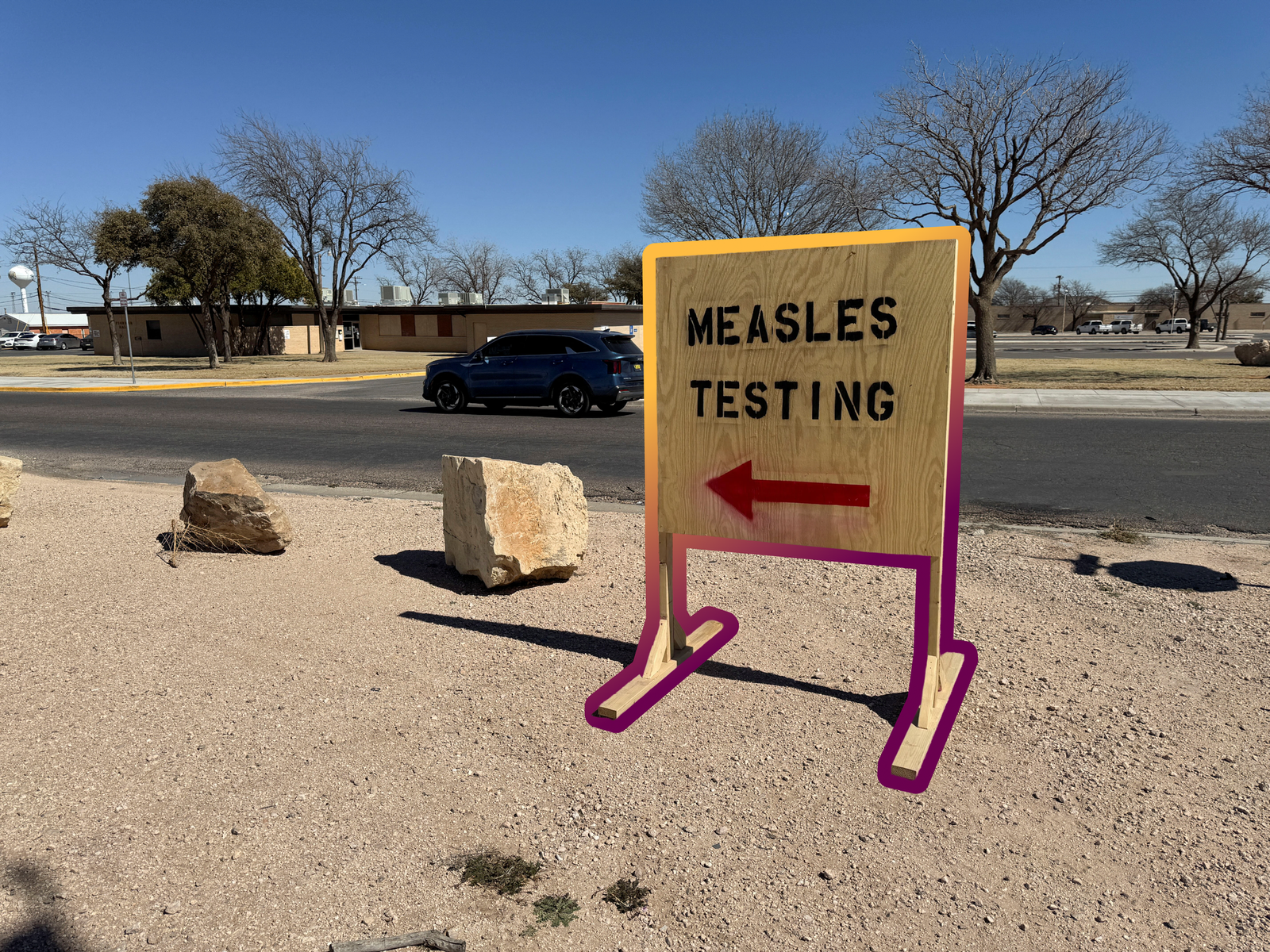 A sign reading "measles testing" in Gaines County, Texas — February 25, 2025 | REUTERS/Sebastian Rocandio, edited by Russell Nystrom