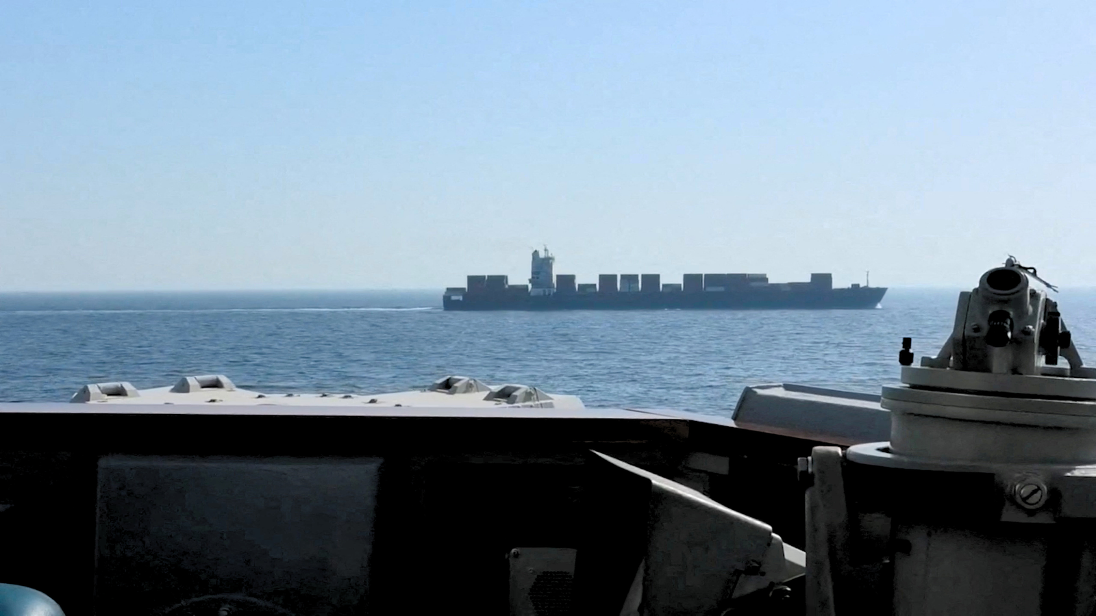 USS Spruance intercepts the Iranian-flagged cargo ship Touska in the north Arabian Sea | CENTCOM/Handout via Reuters, edited by Russell Nystrom