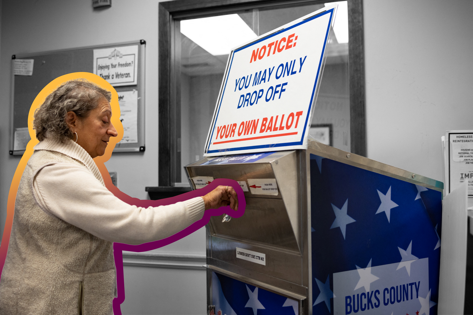 A poll worker locks the ballot box for the night in Levittown, Pennsylvania on October 24, 2022 | REUTERS/Hannah Beier, edited by Russell Nystrom