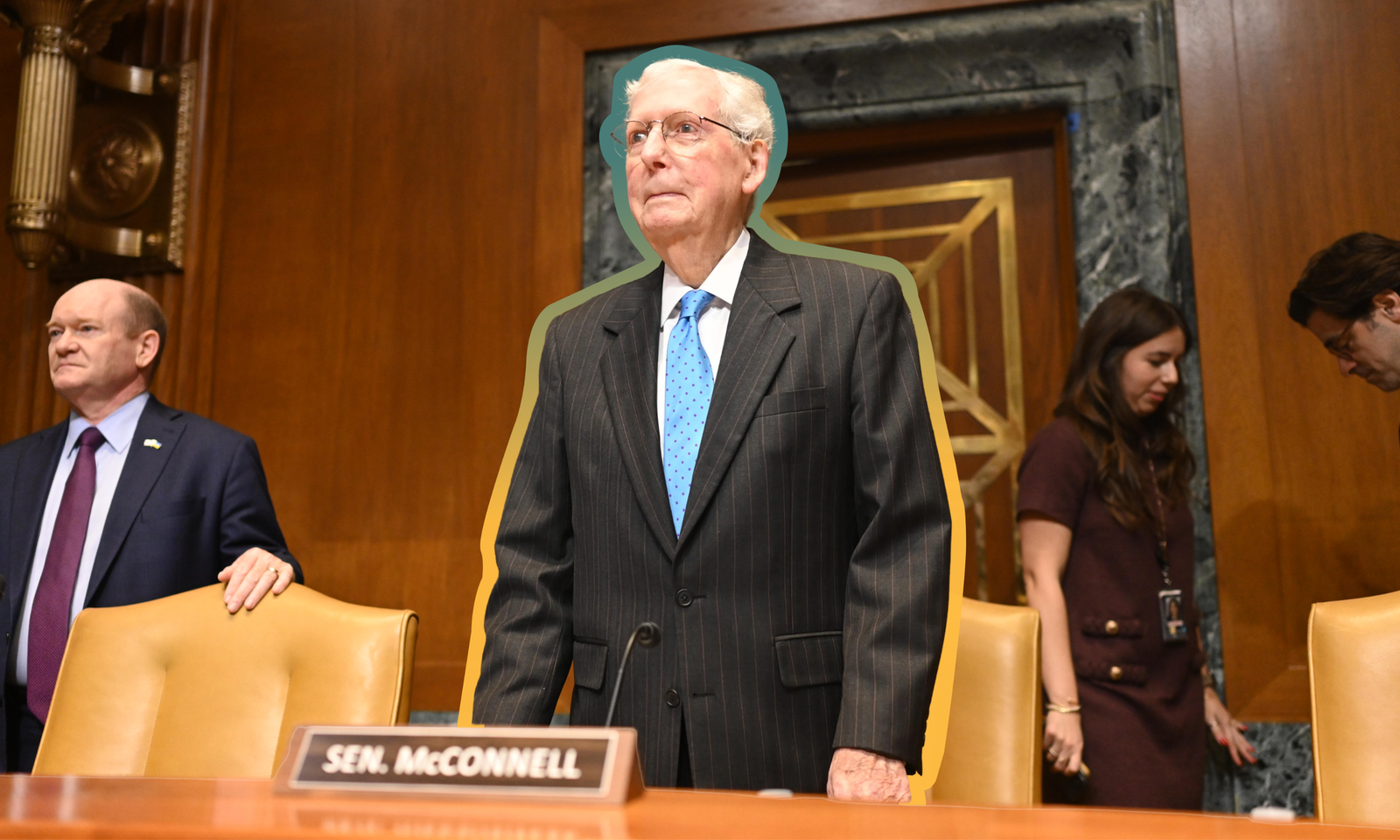 Sen. Mitch McConnell (R-KY) stands during a Senate committee hearing.