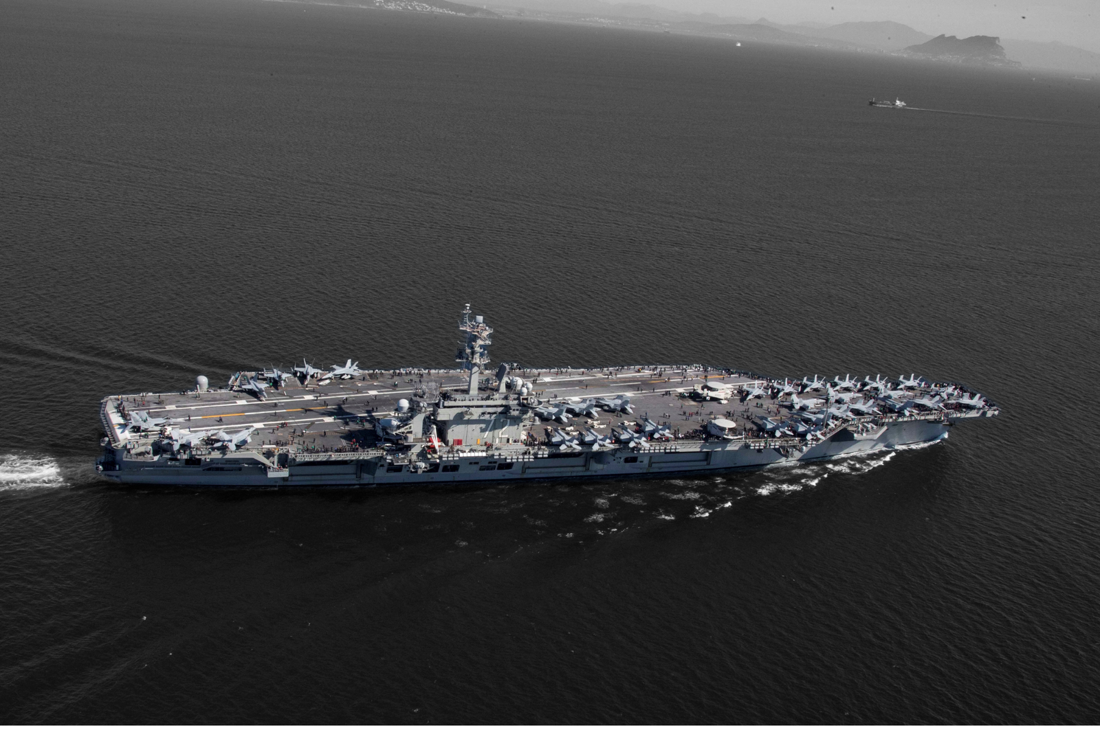  The USS Abraham Lincoln (CVN 72) transits the Strait of Gibraltar in April, 2019.