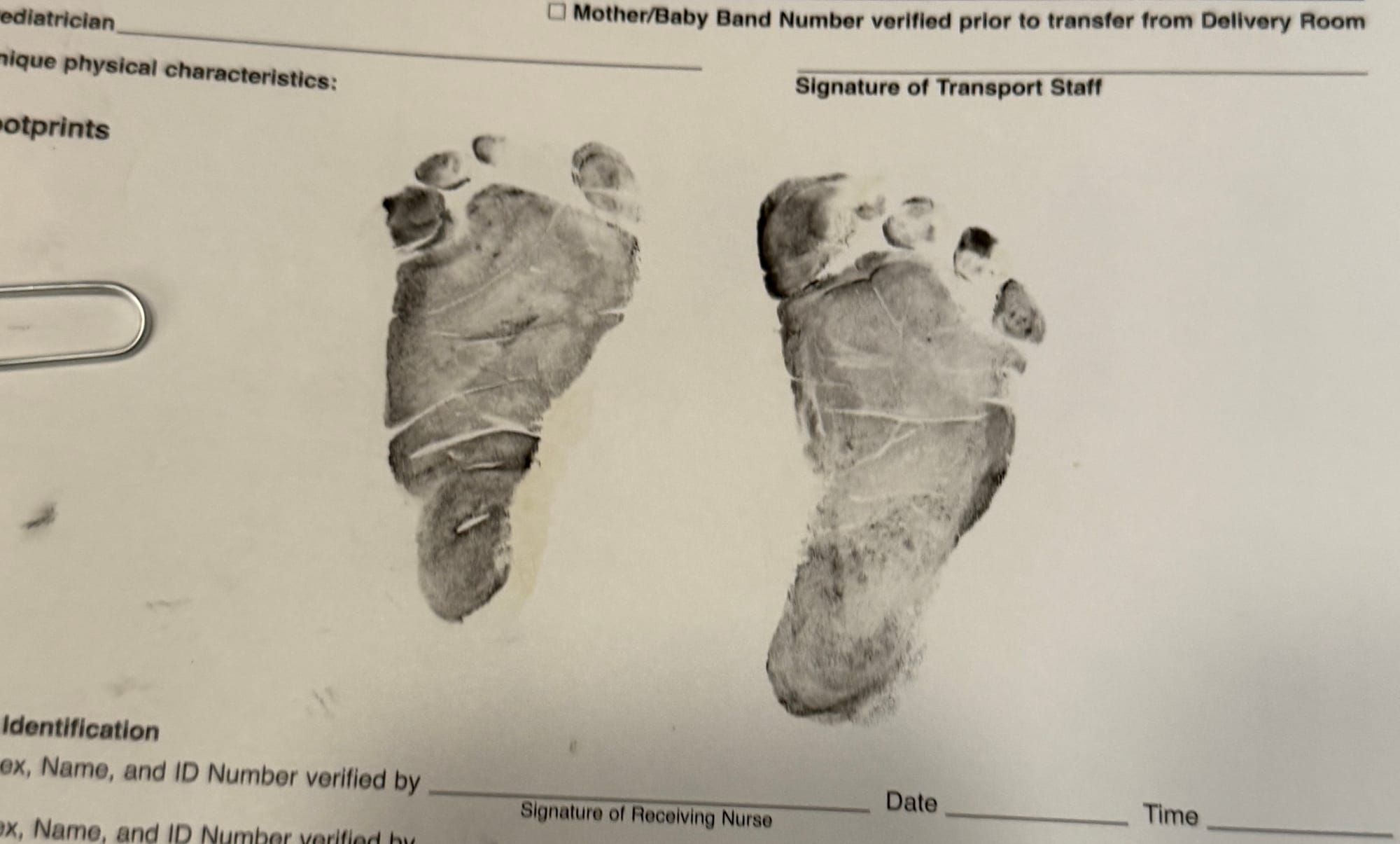 Baby footprints on a medical document.