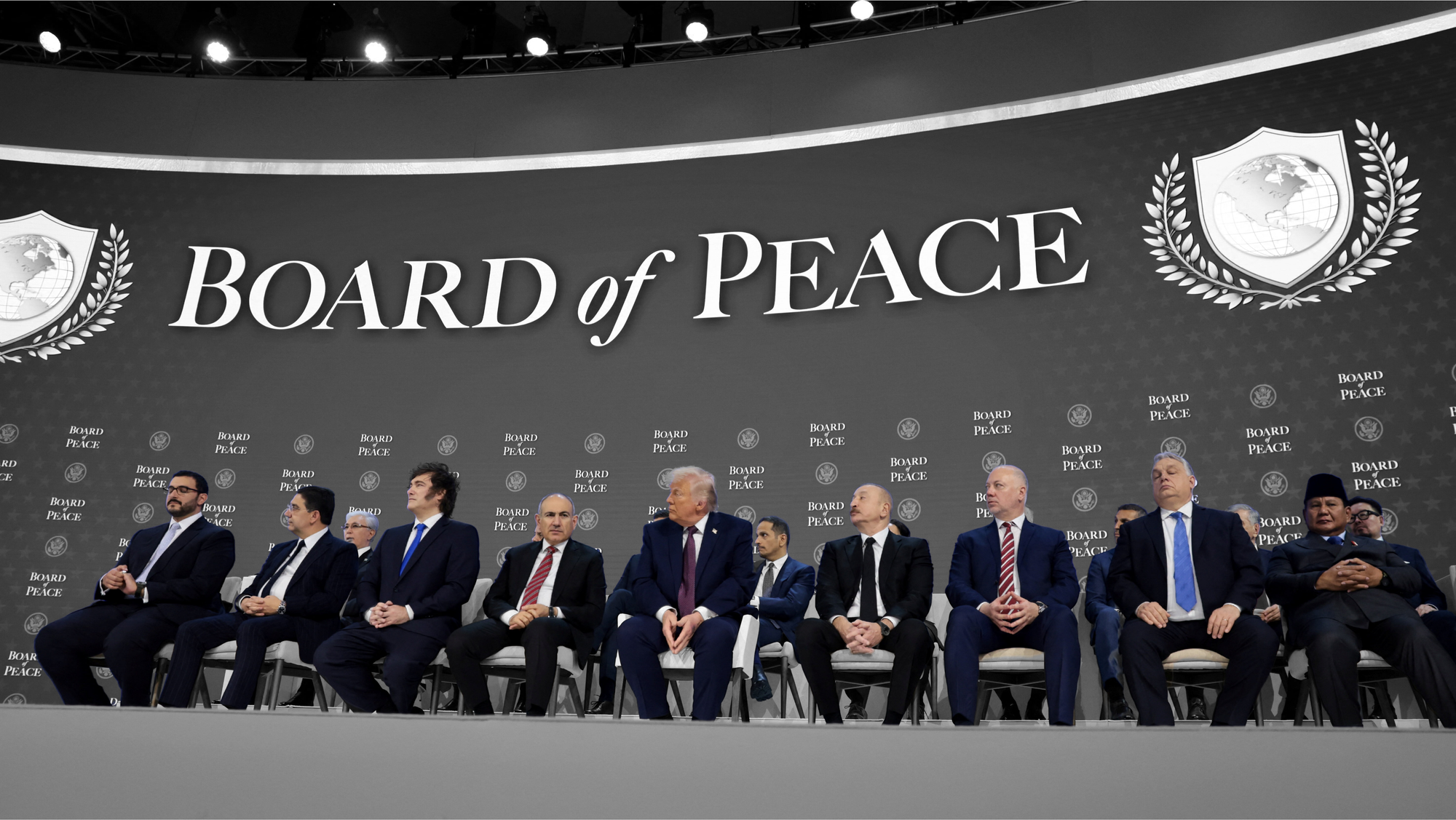 Members of President Donald Trump's Board of Peace initiative at the 56th annual World Economic Forum in Davos, Switzerland | REUTERS/Jonathan Ernst, edited by Russell Nystrom