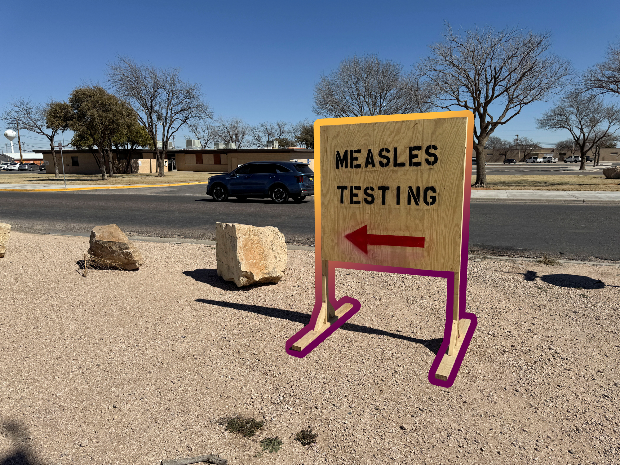 A sign reading "measles testing" in Gaines County, Texas — February 25, 2025 | REUTERS/Sebastian Rocandio, edited by Russell Nystrom