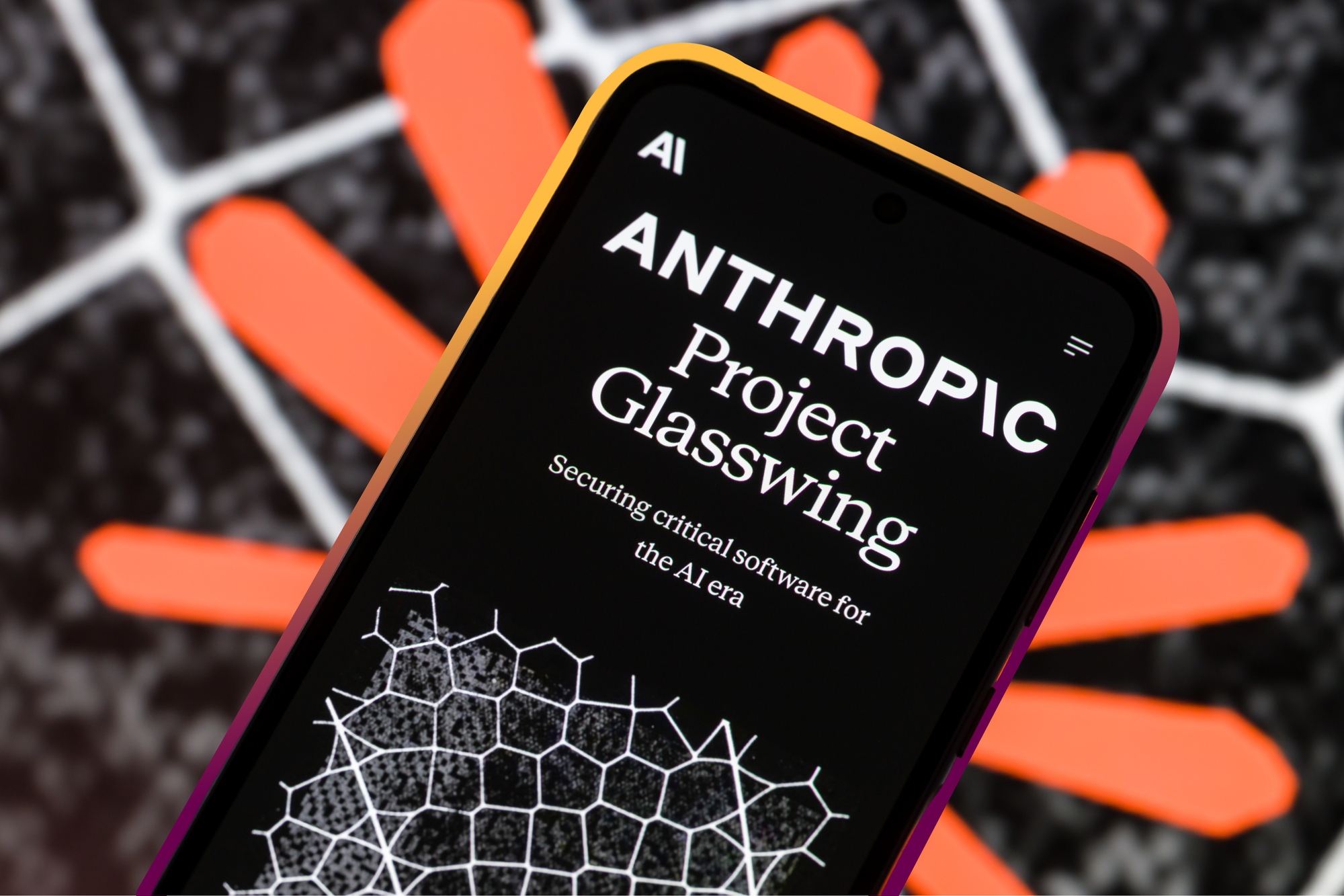 Anthropic’s Project Glasswing website is displayed on a smartphone screen | Jonathan Raa/NurPhoto, edited by Russell Nystrom